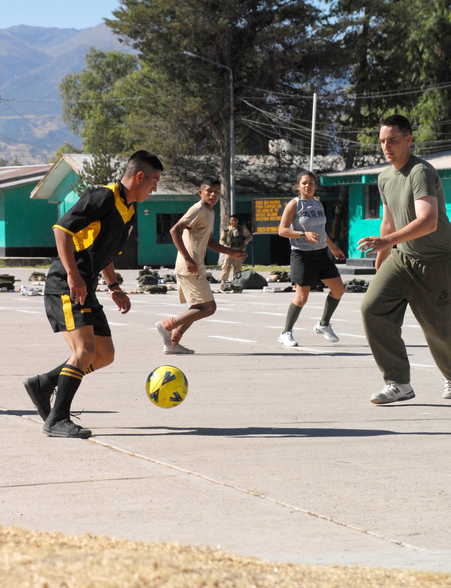U.S. servicemembers assigned to Task Force New Horizons, and Peruvian soldiers play a game of soccer during their off time, June 8, on a Peruvian Army base in Ayacucho, Peru, the region benefiting from the humanitarian efforts of New Horizons Peru-2008. New Horizons is a U.S. and Peruvian partnered effort to help underprivileged Peruvians by building schools, clinics, and wells. (U.S. Air Force photo/Airman 1st Class Tracie Forte)
