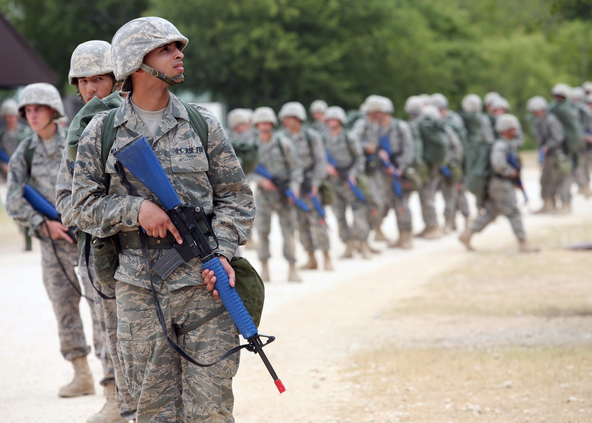 6/9/2008 - Basic trainees march to Lackland's Improvised Explosive Device Training Lane for the Run phase of IED training. The Run phase of the training emphasizes identification of and appropriate reaction to various camouflaged devices.
(USAF photo by Robbin Cresswell)