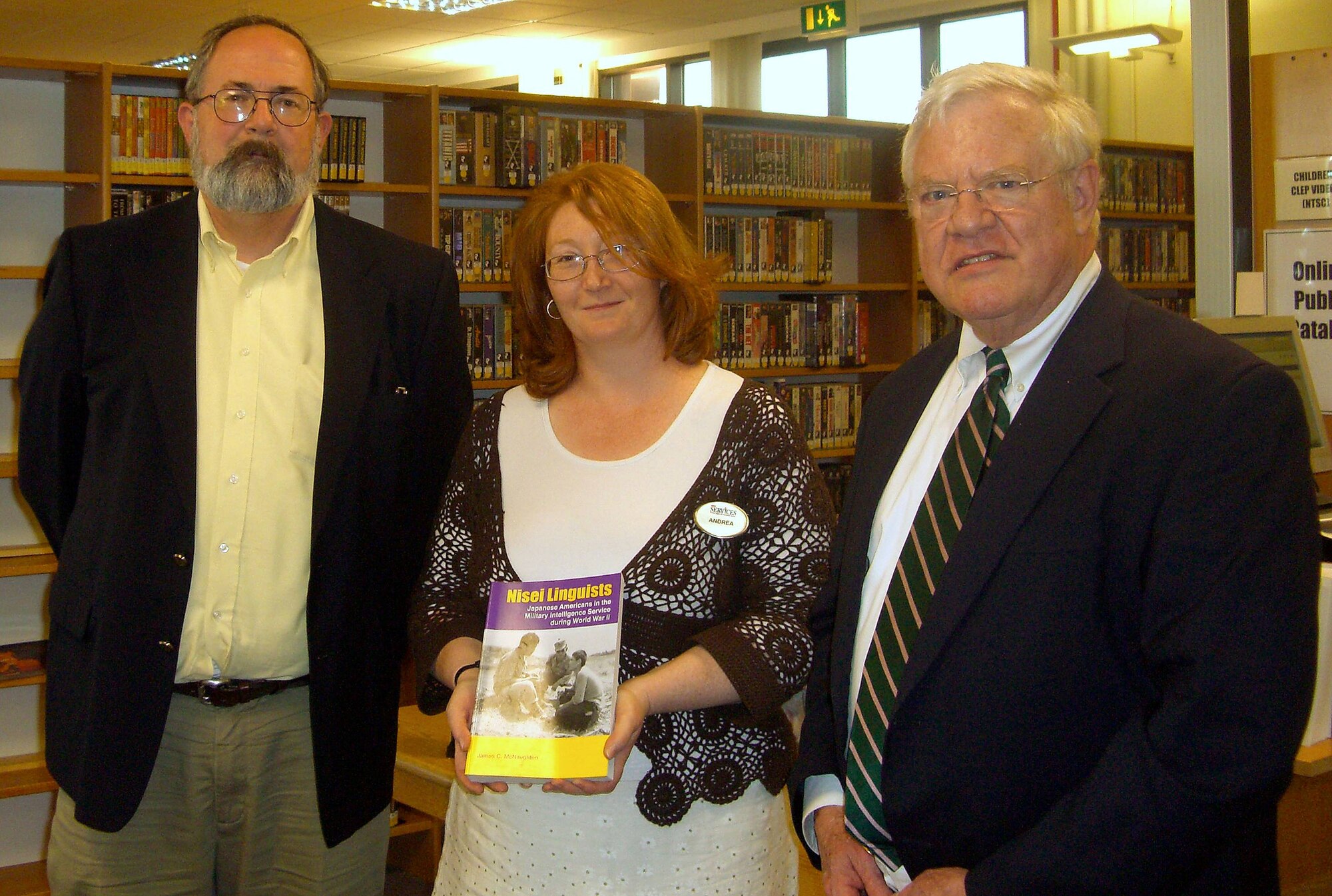 Ms. Andrea Sevier of the Royal Air Force Alconbury Library accepts a copy of the book  “Nisei Linguists: Japanese American in the Military Intelligence Service during World War II” by U.S. European Command Historian, Dr. James C. McNaughton.  Dr. McNaughton recently visited the Tribase and spoke about his research during a WWII themed tribase professional development seminar at RAF Molesworth.  Joining Ms. Sevier are 501st Combat Support Wing Historian Mr. Jerry A. White, Jr., and Mr. Peter G. Park of the JAC Commander's Action Group (U.S. Air Force Photo)