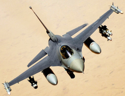 An F-16 Fighting Falcon aircraft returns to the fight after receiving fuel June 10 during a mission over Iraq. The F-16 is assigned to Balad Air Base, Iraq, and is deployed from Hill Air Force Base, Utah. (U.S. Air Force photo/Master Sgt. Andy Dunaway) 