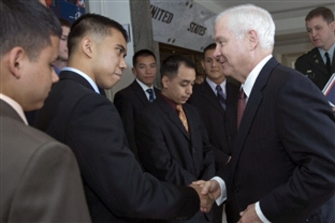 U.S. Defense Secretary Robert M. Gates thanks U.S. Marines assigned to the U.S. Embassy in Belgium after attending two days of meetings at the NATO Defense Ministerial in Brussels, Belgium, June 13, 2008.  