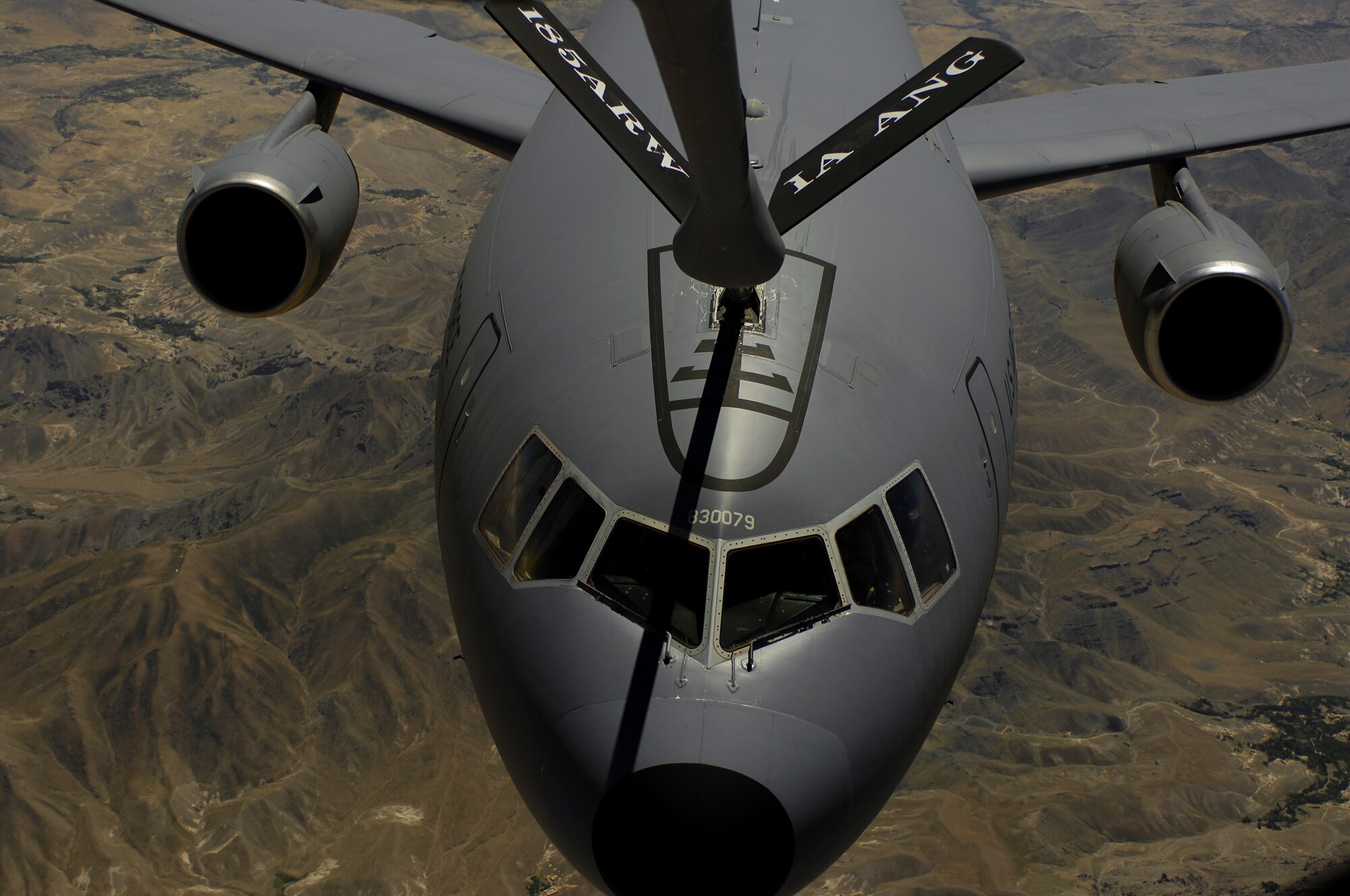 A KC-10 Extender moves into position to receive fuel from a KC-135 Stratotanker during a mission over Afghanistan. The KC-10 is deployed from McGuire Air Force Base, N.J.,  and the KC-135 is deployed from the 174th Air Refueling Squadron from Sioux City, Iowa.(U.S. Air Force photo/Master Sgt. Andy Dunaway)
