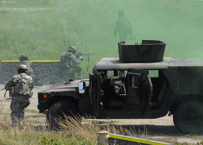 PACAF airmen participate in a Tactical Weapons Simualtion during PACAF's Commando Warrior on June 14 at Andy South here. Commando Warrior is a seven day pre-deployment training for PACAF's Security Forces airmen hosted by the 736th Security Forces Squadron, Andersen AFB, Guam. (U.S. Air Force photo by Airman 1st Class Nichelle Griffiths)

