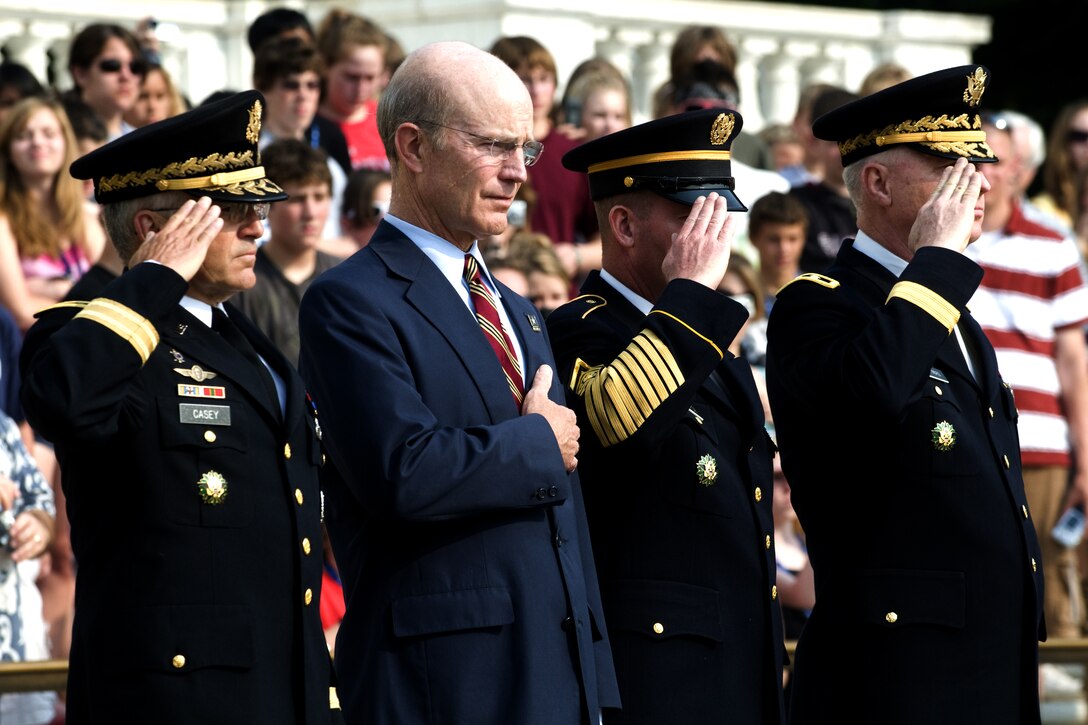 From left: Army Chief of Staff Gen. George Casey,  Army Secretary Pete Geren, Sgt. Maj. of the Army Kenneth Preston and Army Maj. Gen. Galen Jackman salute while Taps is played for the Army's 233rd birthday tribute at Arlington National Cemetery, Va., June 14, 2008.