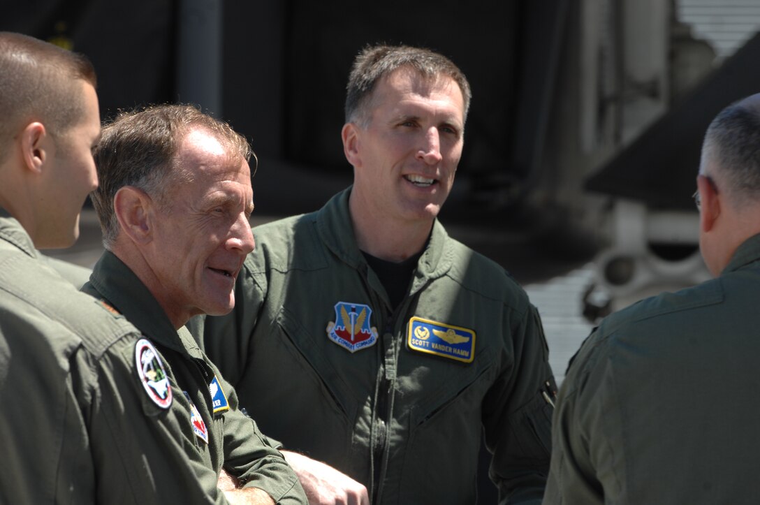 (Second from left) Lt. Gen. Norman Seip, 12th Air Force commander, and Col. Scott Vander Hamm, 28th Bomb Wing commander, discuss B-1 Sniper Pod status with members of the Sniper Pod integration team here June 14. General Seip was able to examine the pod after touring several training sites involved in the 2008 Golden Coyote exercise. (U.S. Air Force photo/Airman Corey Hook)








