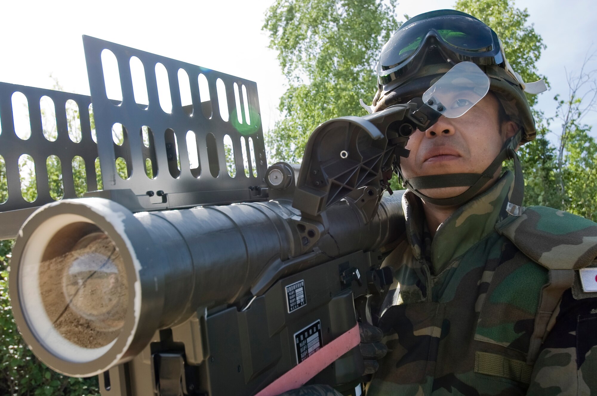 Staff Sgt. Masayuki Inomata operates a Type 91 Sam-2 Surface to Air missile launcher at enemy aircraft on the Pacific Alaskan Range Complex June 11, 2008 during RED FLAG-Alaska 08-3. During this exercise Japanese Forces are positioned in varies locations acting as a threat to blue forces aircraft. He is a missile operator assigned to the Japanese Air Self Defense Force. (U.S. Air Force Photo/Airman 1st Class Jonathan Snyder)