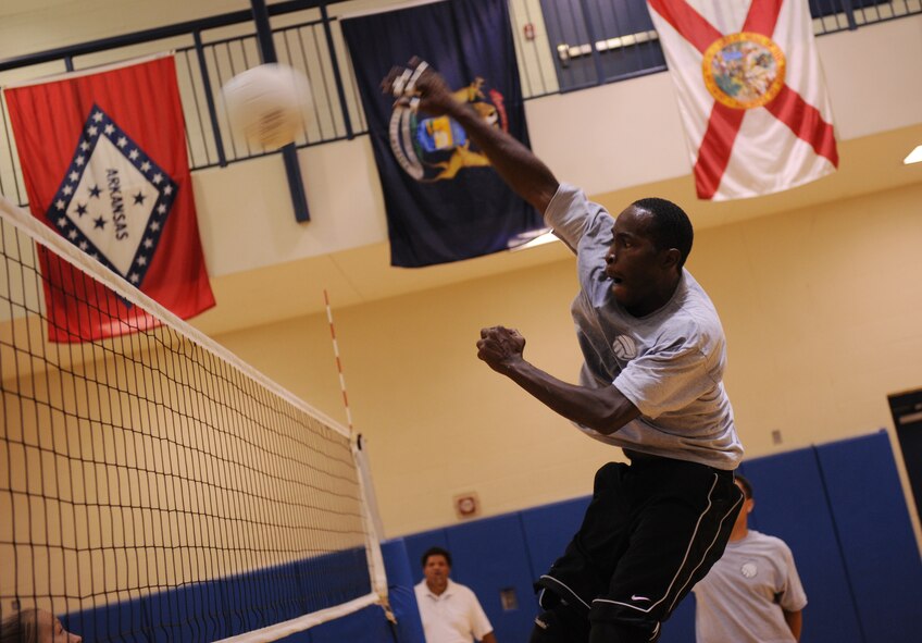 MOODY AIR FORCE BASE, Ga. -- Staff Sgt. Thomas Watson, 723rd Aircraft Maintenance Squadron volleyball team member, spikes the ball during the base intramural championship here June 11. The 723rd AMXS beat the 23rd Force Support Squadron winning two out of three games. (U.S. Air Force photo by Senior Airman Gina Chiaverotti)