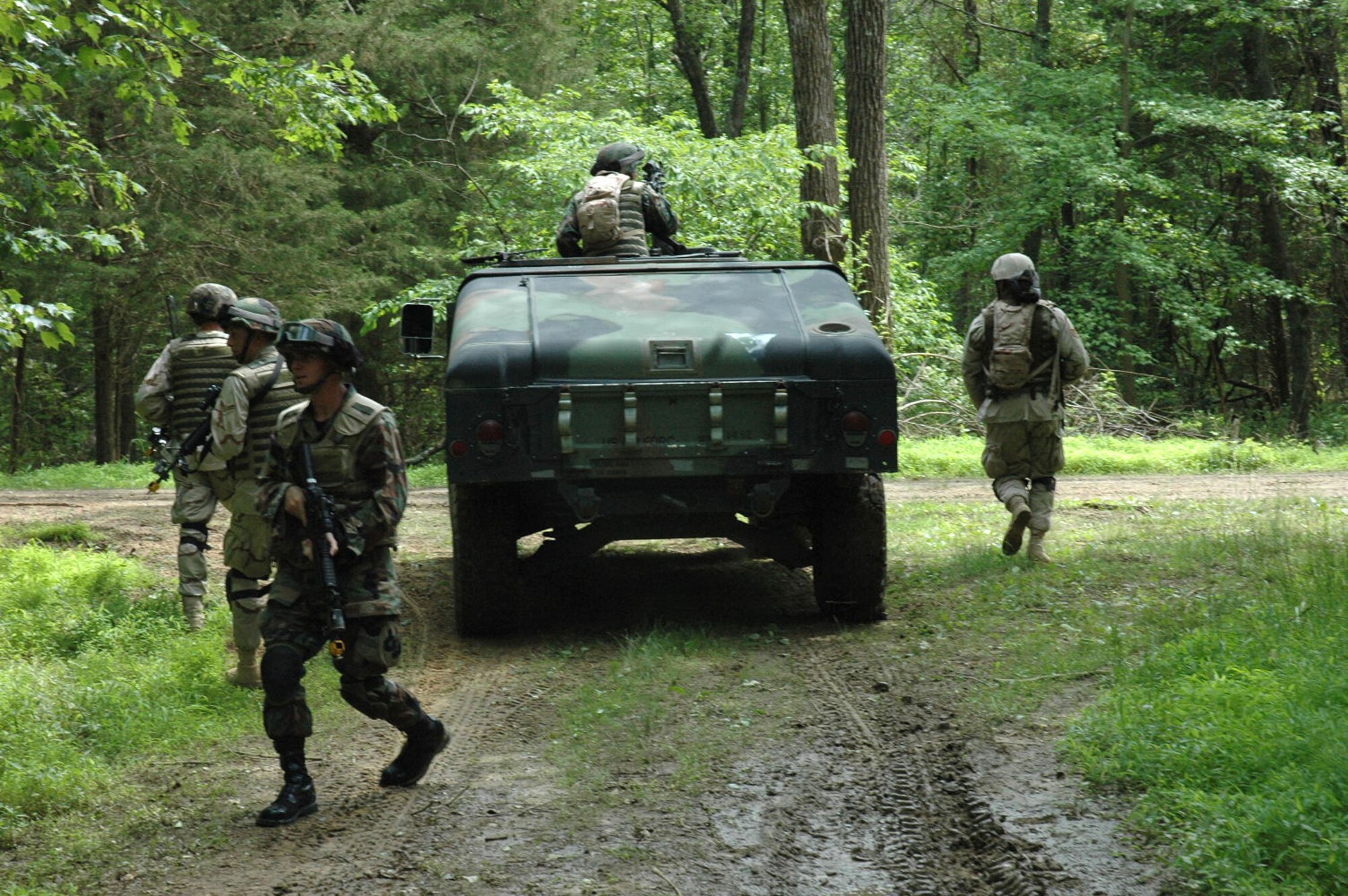 Students in the Air Force Phoenix Warrior Training Course 08-5 practice a dismounted patrol scenario during training on a Fort Dix, N.J., range June 6, 2008.  The course, taught by the U.S. Air Force Expeditionary Center's Expeditionary Operations School and 421st Combat Training Squadron, prepares security forces Airmen for upcoming deployments.  (U.S. Air Force Photo/Staff Sgt. Paul R. Evans)