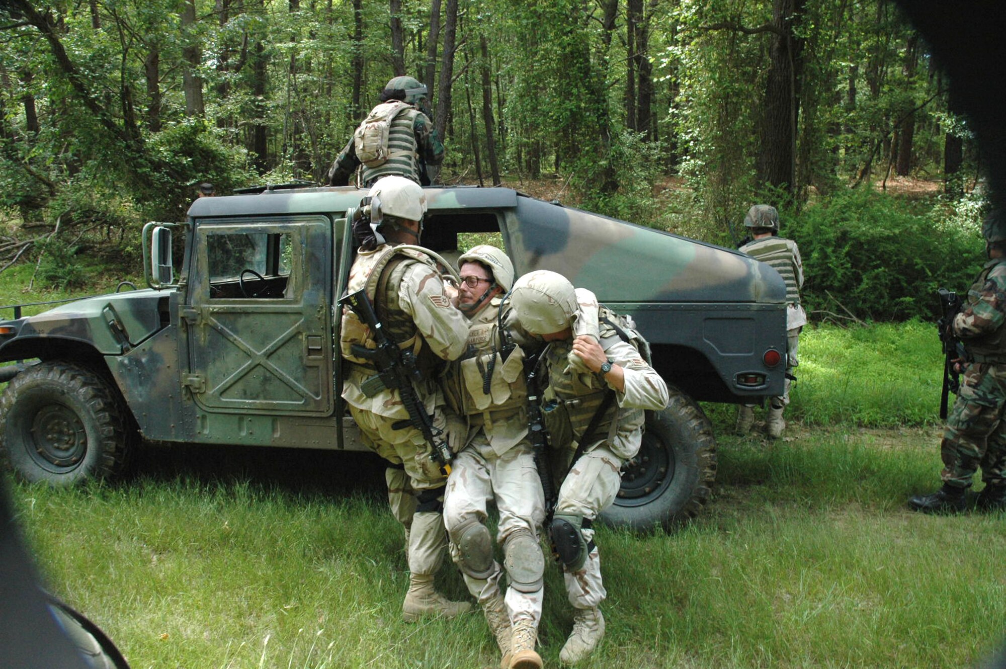 Students in the Air Force Phoenix Warrior Training Course 08-5 practice a dismounted patrol scenario during training on a Fort Dix, N.J., range June 6, 2008.  The course, taught by the U.S. Air Force Expeditionary Center's Expeditionary Operations School and 421st Combat Training Squadron, prepares security forces Airmen for upcoming deployments.  (U.S. Air Force Photo/Staff Sgt. Paul R. Evans)