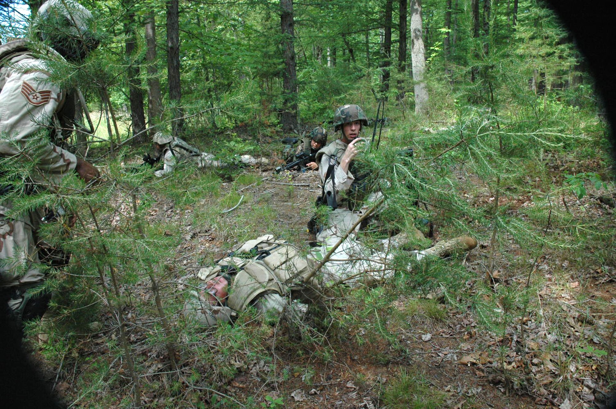 Students in the Air Force Phoenix Warrior Training Course 08-5 practice a dismounted patrol during training on a Fort Dix, N.J., range June 6, 2008.  The course, taught by the U.S. Air Force Expeditionary Center's Expeditionary Operations School and 421st Combat Training Squadron, prepares security forces Airmen for upcoming deployments.  (U.S. Air Force Photo/Staff Sgt. Paul R. Evans)