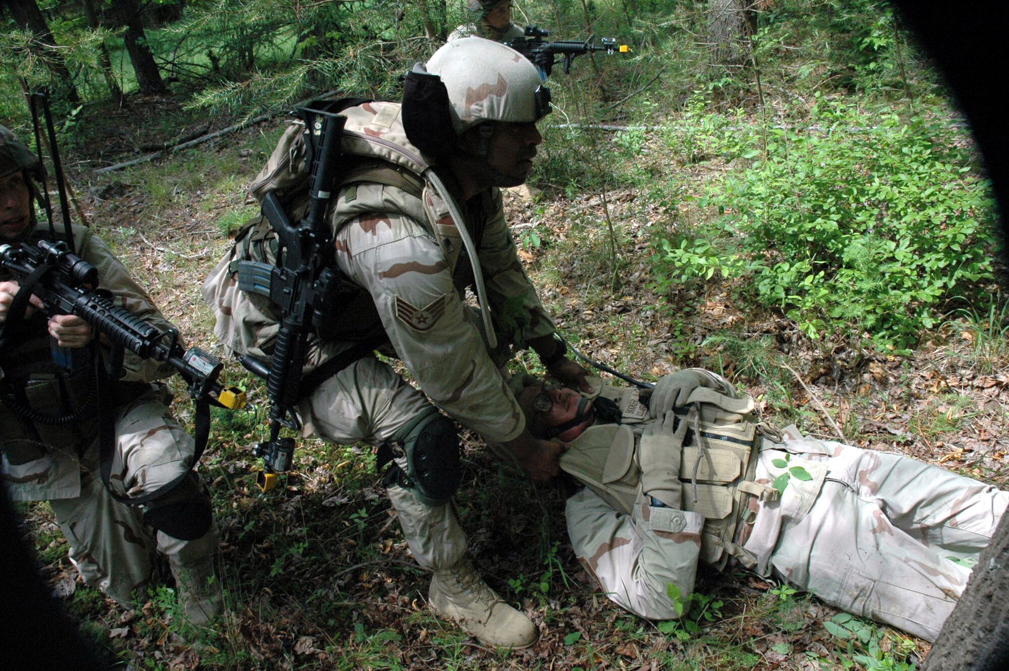 A group of students in the Air Force Phoenix Warrior Training Course 08-5 practice a dismounted patrol during training on a Fort Dix, N.J., range June 6, 2008.  The course, taught by the U.S. Air Force Expeditionary Center's Expeditionary Operations School and 421st Combat Training Squadron, prepares security forces Airmen for upcoming deployments.  (U.S. Air Force Photo/Staff Sgt. Paul R. Evans)