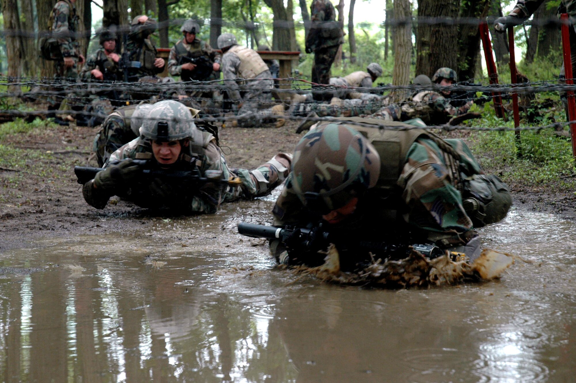 Students in the Air Force Phoenix Warrior Training Course 08-5 participate in a combat first aid class on a Fort Dix, N.J., range June 5, 2008.  The course is taught by the U.S. Air Force Expeditionary Center's Expeditionary Operations School and 421st Combat Training Squadron and prepares security forces Airmen for upcoming deployments. Annually, the USAF EC trains more than 23,000 students in expeditionary- and mobility air force-based courses both with in-residence and distance learning.  (U.S. Air Force Photo/Staff Sgt. Paul R. Evans)
