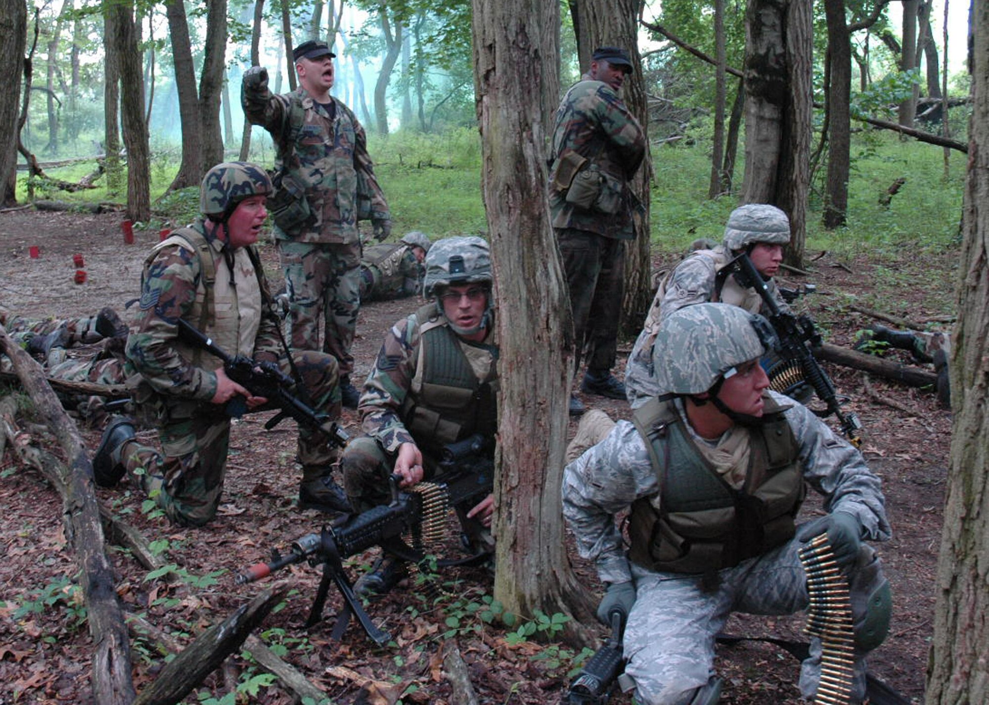 Students in the Air Force Phoenix Warrior Training Course 08-5 participate in a combat first aid class on a Fort Dix, N.J., range June 5, 2008.  The course is taught by the U.S. Air Force Expeditionary Center's Expeditionary Operations School and 421st Combat Training Squadron and prepares security forces Airmen for upcoming deployments. Annually, the USAF EC trains more than 23,000 students in expeditionary- and mobility air force-based courses both with in-residence and distance learning.  (U.S. Air Force Photo/Staff Sgt. Paul R. Evans)