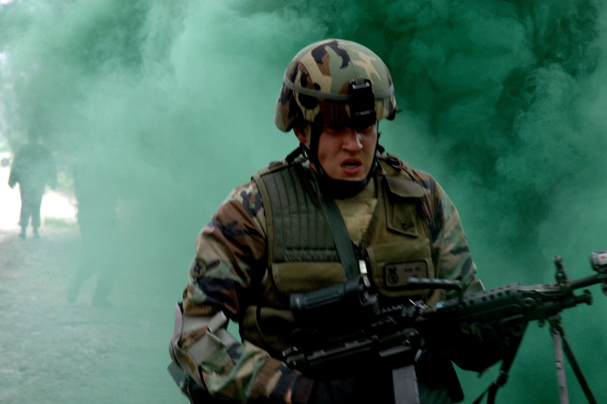 Airman Ryan Peil, 30th Security Forces Squadron, Vandenburg Air Force Base, Calif., and other students in the Air Force Phoenix Warrior Training Course 08-5 participate in a combat first aid class on a Fort Dix, N.J., range June 5, 2008.  The course is taught by the U.S. Air Force Expeditionary Center's Expeditionary Operations School and 421st Combat Training Squadron and prepares security forces Airmen for upcoming deployments. Annually, the USAF EC trains more than 23,000 students in expeditionary- and mobility air force-based courses both with in-residence and distance learning.  (U.S. Air Force Photo/Staff Sgt. Paul R. Evans)