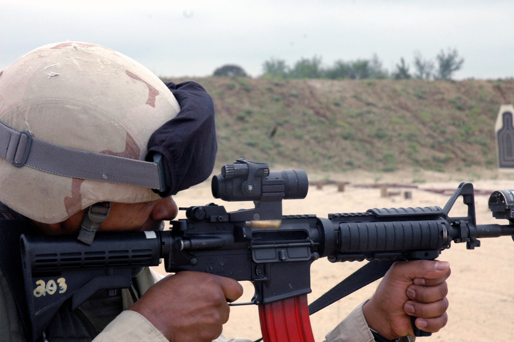A student in the Air Force Phoenix Warrior Training Course 08-5 shoots an M-4 rifle during live-fire combat rifle training on a range on Fort Dix, N.J., June 5, 2008.  The course, taught by the U.S. Air Force Expeditionary Center's 421st Combat Training Squadron, prepares security forces Airmen for upcoming deployments.  Annually, more than 23,000 students are trained at the USAF EC through in-residence and distance learning courses.  (U.S. Air Force Photo/Staff Sgt. Paul Evans)