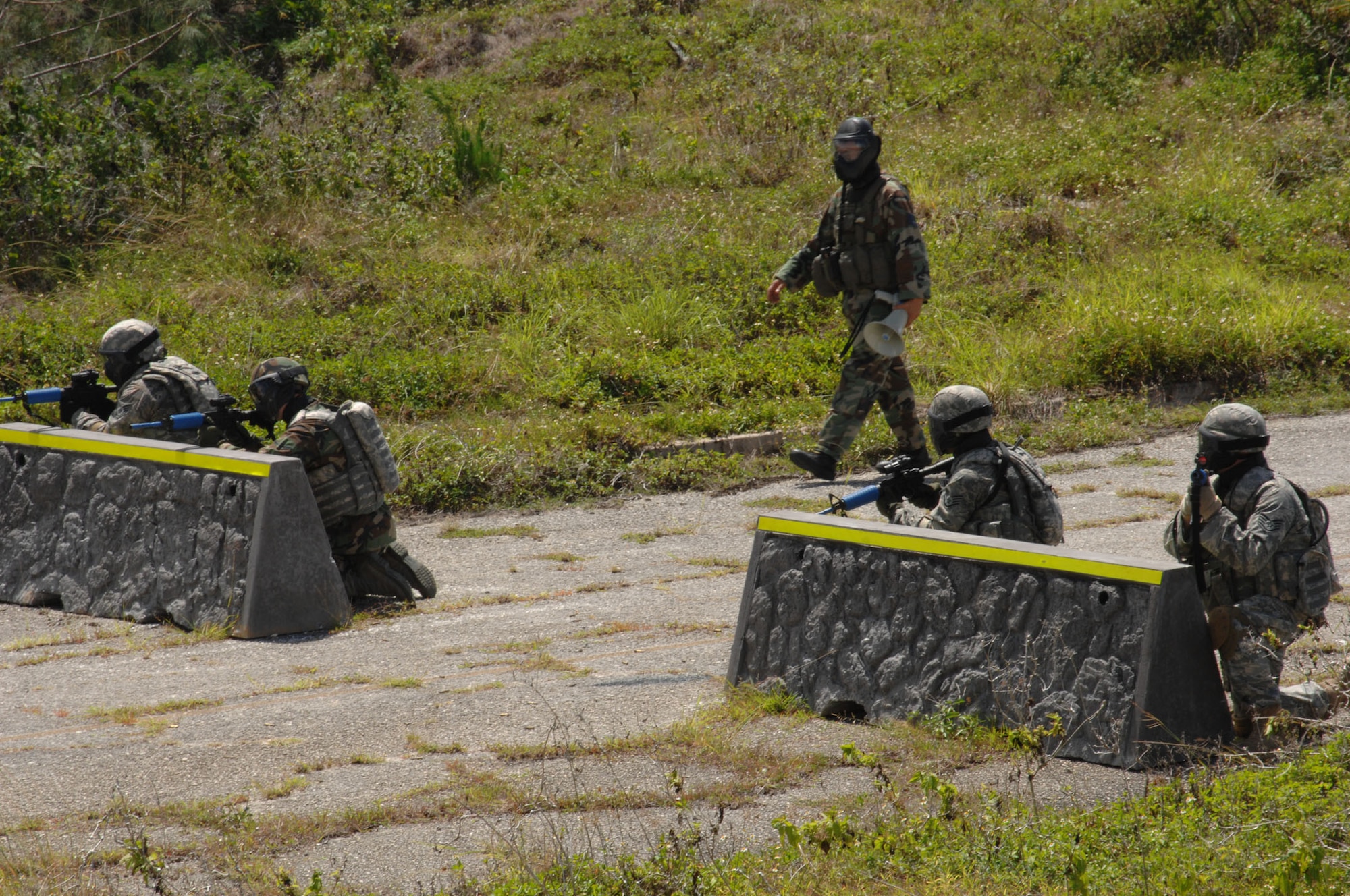 PACAF airmen participate in a Tactical Weapons, Simualtion during Commando Warrior on June 14 at Andy South here. Commando Warrior is a seven day pre-deployment training for PACAF's Security Forces airmen hosted by the 736th Security Forces Squadron, Andersen AFB, Guam. (U.S. Air Force photo by Airman 1st Class Nichelle Griffiths)