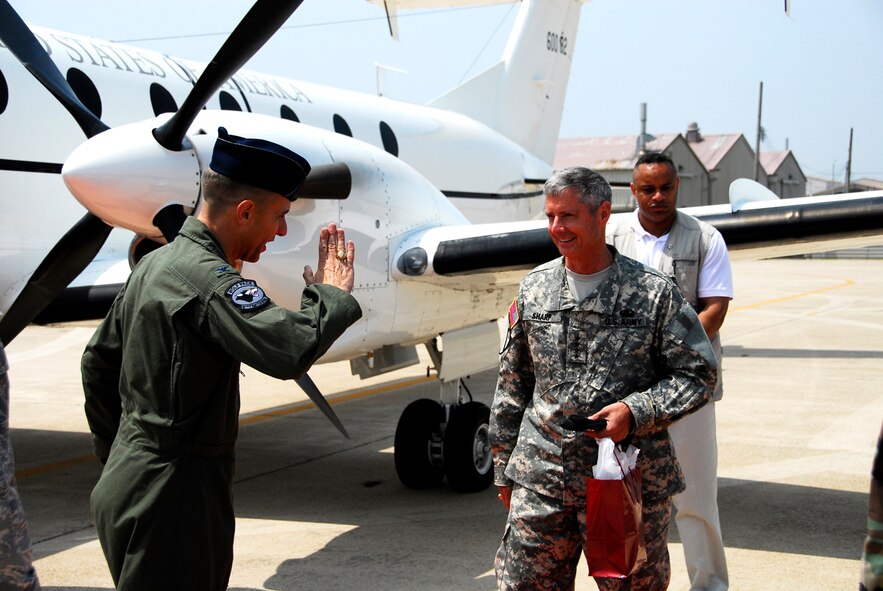 KUNSAN AIR BASE, Republic of Korea -- Colonel Bryan Bearden, 8th Fighter Wing Commander, says goodbye to United States Forces Korea Commander General Walter Sharp after his visit to here June 13.  Gen. Sharp recently took command of USFK and is visiting various areas throughout Korea.  (U.S. Air Force photo/Tech. Sgt. Quinton T. Burris) 