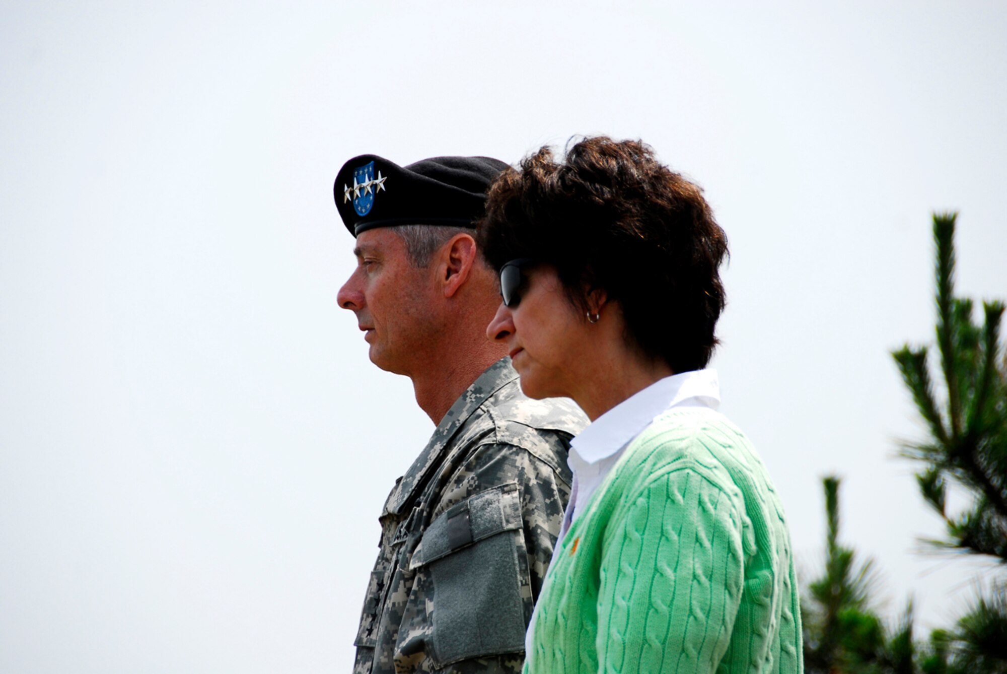 KUNSAN AIR BASE, Republic of Korea -- U.S. Army General Walter and Joanne Sharp receive the Wolf Pack mission brief atop Big Coyote during their visit here June 13.  Gen. Sharp, United States Forces Korea Commander, recently took command and is visiting various areas throughout Korea.  (U.S. Air Force photo/Tech. Sgt. Quinton T. Burris) 