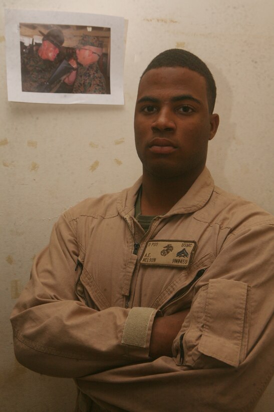 Standing with pride at Camp Korean Village, Iraq, June 15, Cpl. Andrew E. Nelson, 21, a personnel clerk with 2nd Light Armored Reconnaissance Battalion, Regimental Combat Team 5, came from being broke to becoming a successful Marine striving to be a drill instructor. After hard and struggling times being brought up in southwestern Philadelphia, Nelson decided to change his life.