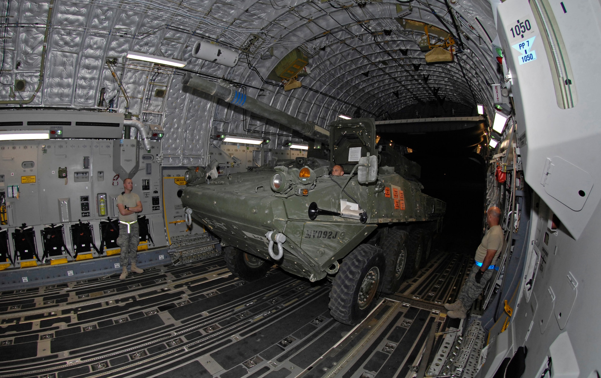 Reservists assigned to the 332nd Expeditionary Logistical Readiness Squadron at Balad Air Base, Iraq, drive a Striker onto a C-17 Globemaster III for transport to Ramstein Air Base, Germany on June 16, 2008. The 332nd ELRS is comprised of Airmen from Andersen Air Force Base, Guam, Hickam Air Force Base, Hawaii, Niagra Falls, Tinker Air Force Base, Ok., and Travis Air Force Base, Calif. The C-17 belongs to the 15th Airlift Wing at Hickam Air Force Base, Hawaii, and was flown into Balad from Ramstein AB by an Air Mobility Command crew. (US Air Force photo / Tech. Sgt. Chris Vadnais)