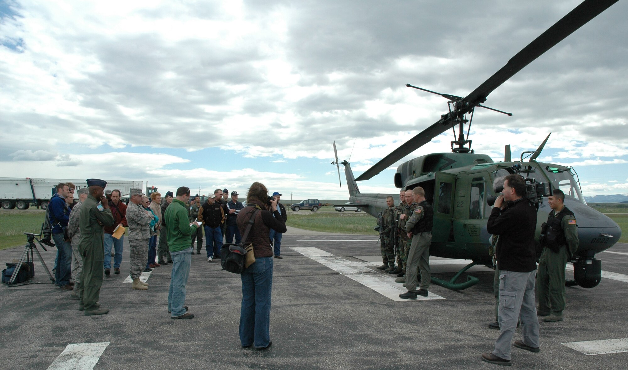 Members of the 40th Helicopter Squadron and the 341st Security Forces Group Tactical Response Force describe their role in the strategic deterrent mission and showcase their equipment during an open house for local elected officials and local news affiliates at Mike-01 June 13. (U.S. Air Force photo/Airman 1st Class Dillon White)