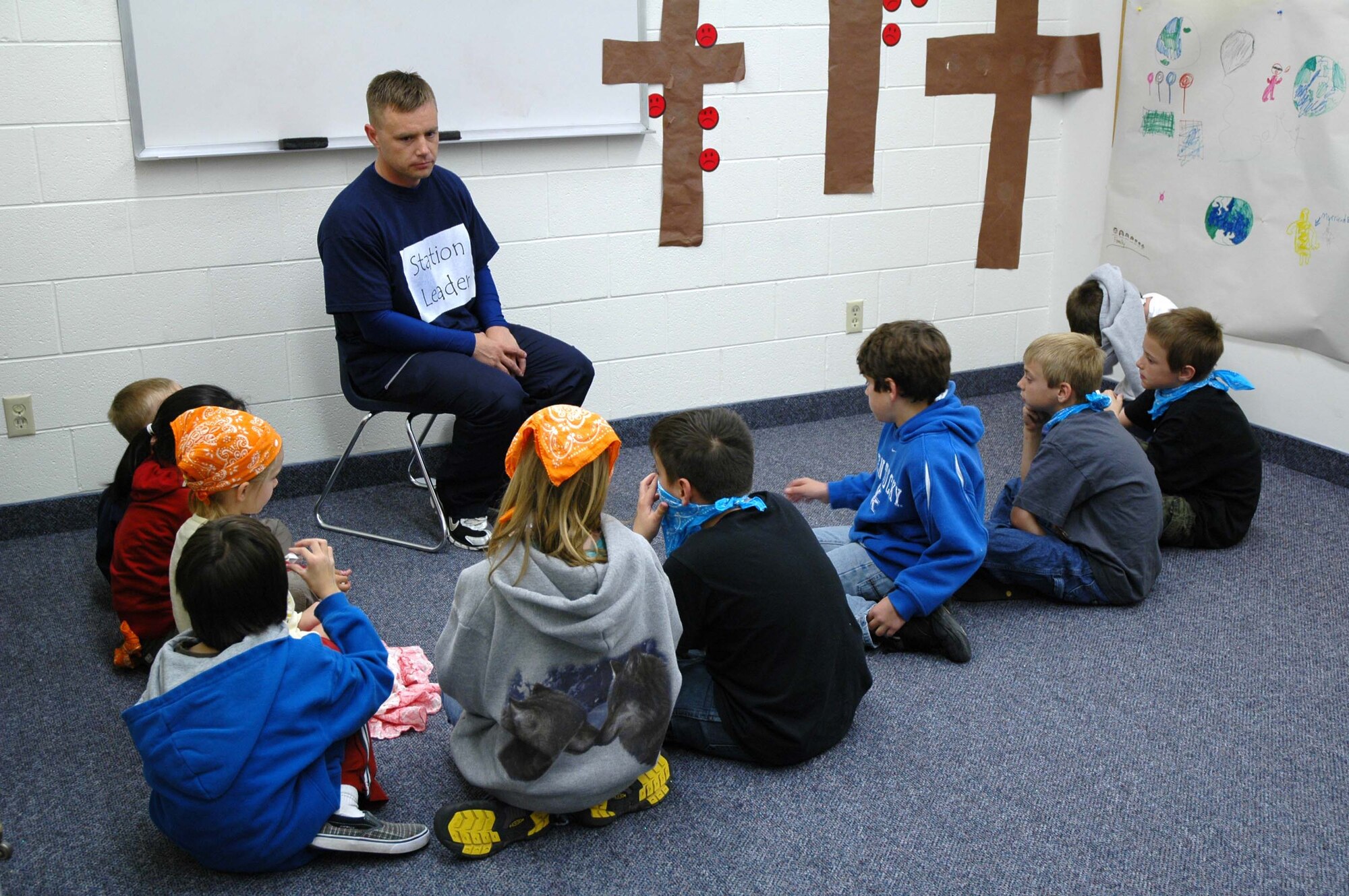 Chaplain (Capt.) Jeromy Wells, a 341st Space Wing chaplain, teaches a Vacation Bible School "Bible Blast" lesson in the base chapel annex June 12. (U.S. Air Force photo/Airman 1st Class Dillon White)