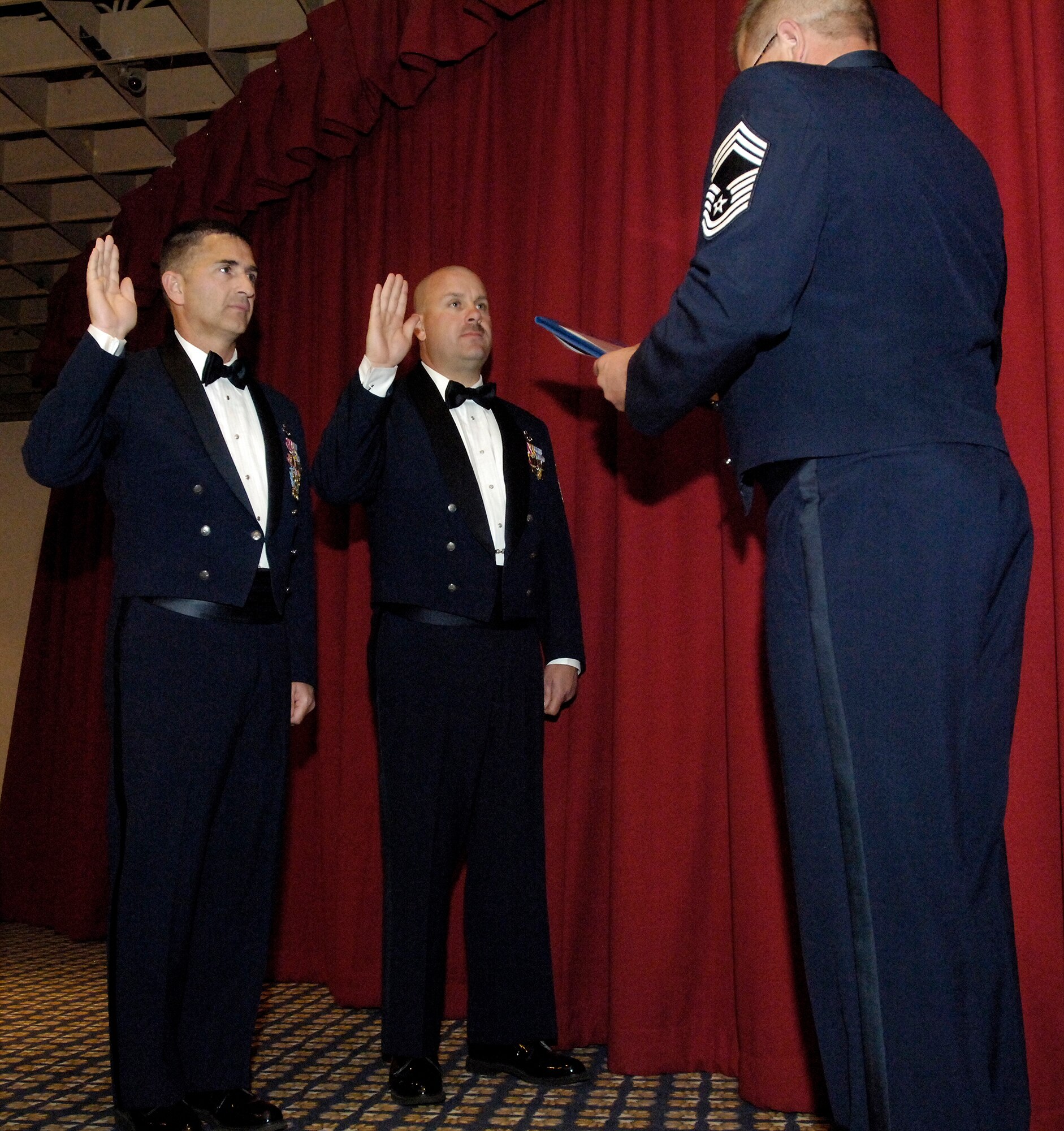 FAIRCHILD AIR FORCE BASE, Wash. – Senior Master Sgts. Michael Joyner, 92nd Maintenance Squadron, and Warren Scott, 92nd Aircraft Maintenance Squadron, recite the Airman’s Creed during the Chief’s Recognition Ceremony at Club Fairchild June 13. (U.S. Air Force photo / Senior Airman Eunique Stevens)