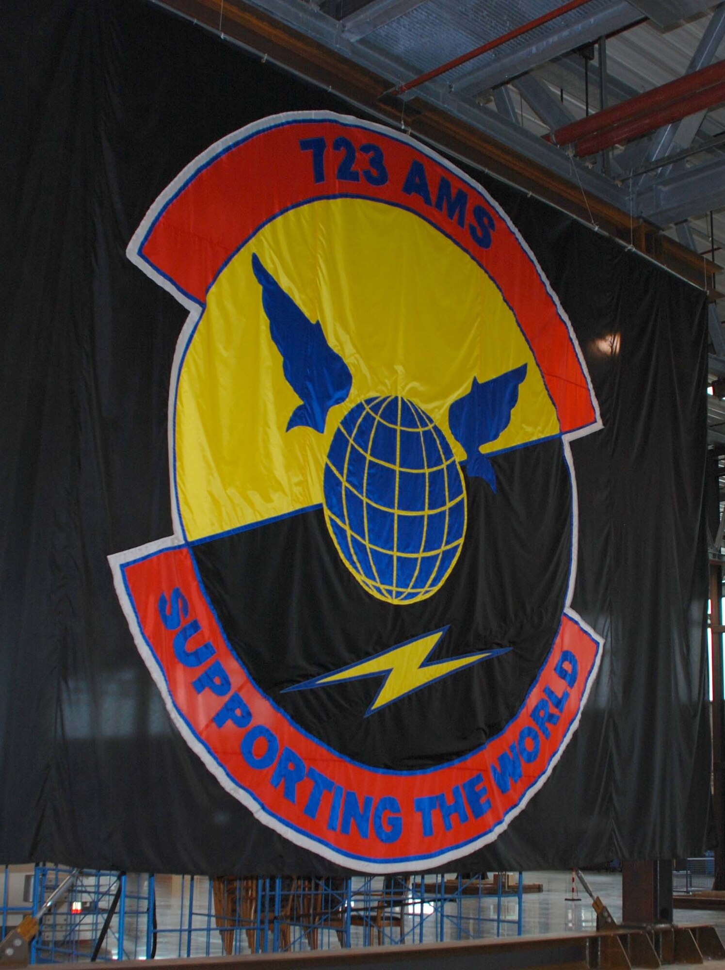 RAMSTEIN AIR BASE, Germany -- A banner for the 723rd Air Mobility Squadron hangs in a mobility warehouse here May 27. Members of the 459th Air Refueling Wing members spent their annual tour here in support of airport operations at U.S. Air Forces in Europe headquarters. (U.S. Air Force photo/Tech. Sgt. Amaani Lyle)