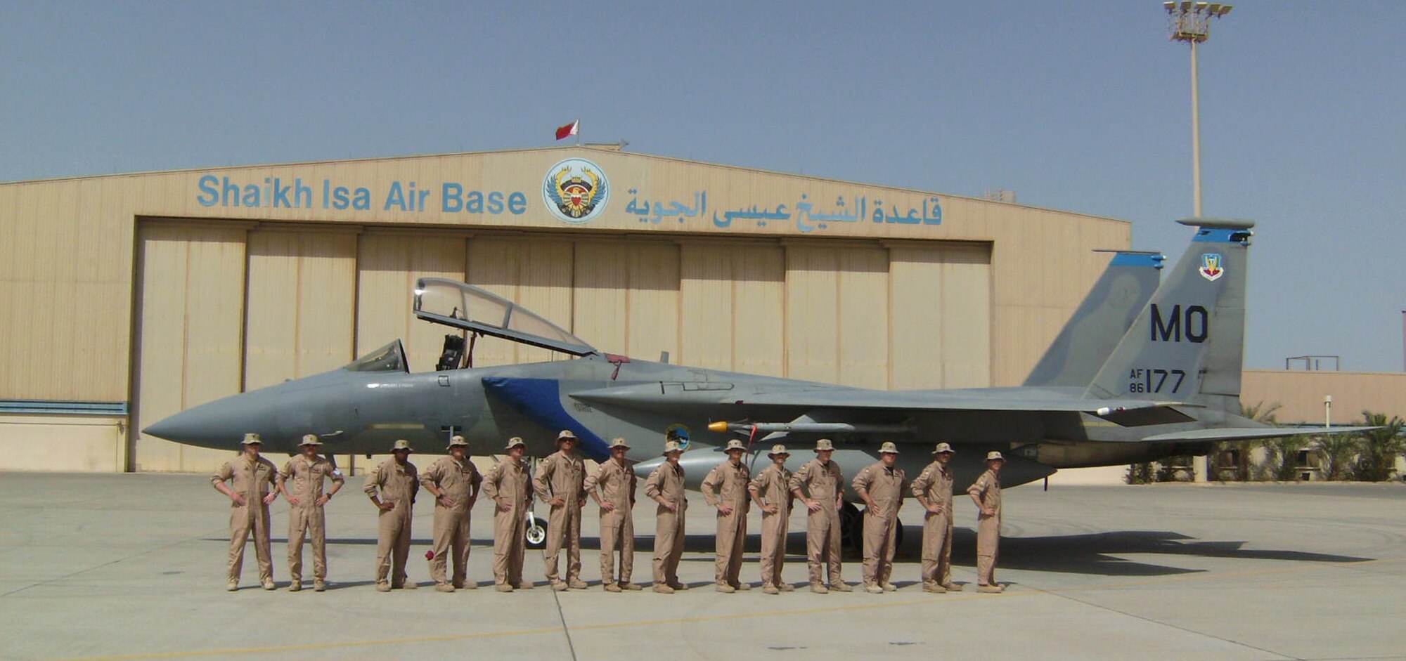 MOUNTAIN HOME AIR FORCE BASE, Idaho - Members of the 390th Fighter Squadron “Wild Boars” stand in front of one of the six F-15Cs on the flightline in Shaik Isa Air Base, Bahrain. The 390th FS participated in a multi-national exercise, FAZAA I, which included forces from the Gulf Coast Coalition states, which are Iran, Iraq, Kuwait, Saudi Arabia, Qatar, the United Arab Emirates and Bahrain, as well as Jordan and Italy May 9 to 18. (Courtesy photo)