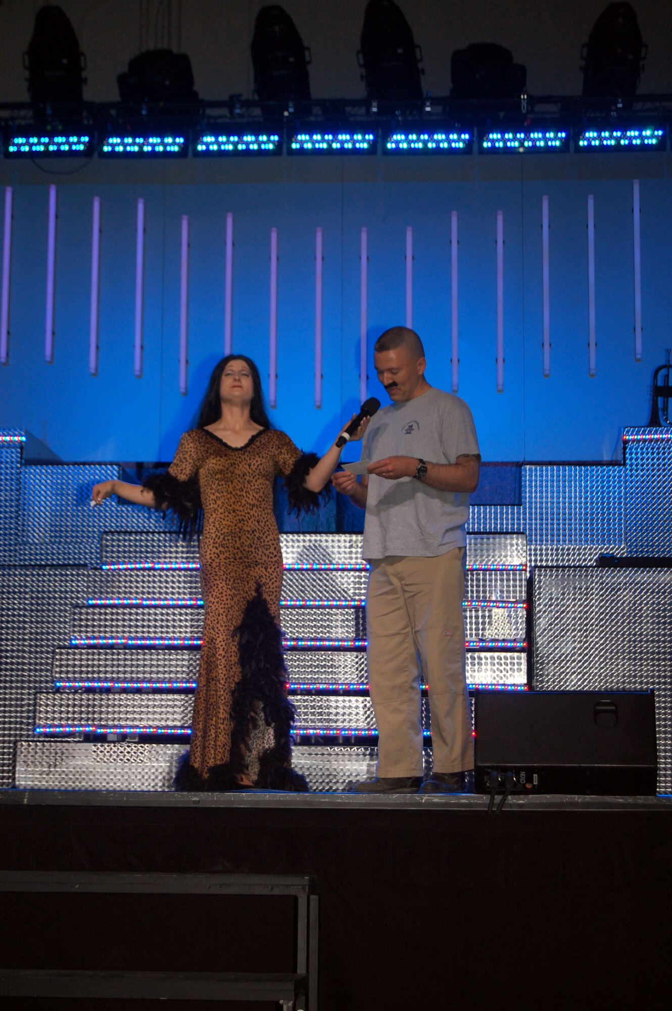 Senior Airman April Vollm, loadmaster journeyman with the 39th Airlift Squadron, Dyess Air Force Base, Texas, selects Master Sgt. Keith Vivian, 341st Mission Support Squadron first sergeant, to perform a rendition of Sonny and Cher's "I Got You, Babe" during an intermisison from the Tops in Blue performance at the Montana Expo Park. (U.S. Air Force photo/Airman 1st Class Emerald Ralston)