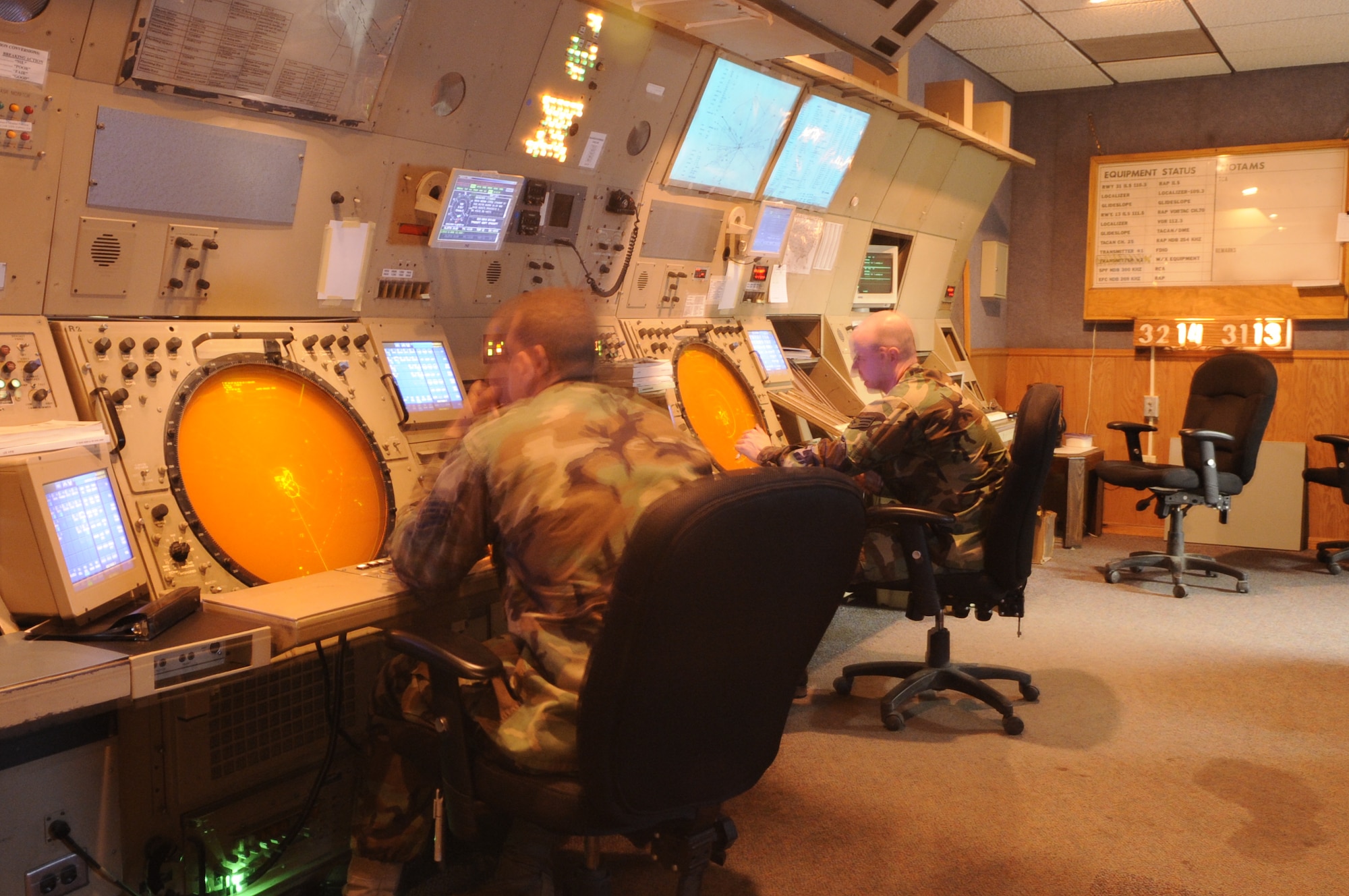 Staff Sgt. Jacob Martin (left) and Senior Airman Scott Causey (right), 28th Operations Support Squadron Air Traffic Control journeymen, monitor the old Radar Approach Control system, here, June 17. This RAPCON system will be updated with the new Surveillance Target Attack Radar System June 30, saving the Air Force $28.7 million over the next 20 years. (U.S. Air Force photo/Airman 1st Class Kasey Zickmund)
