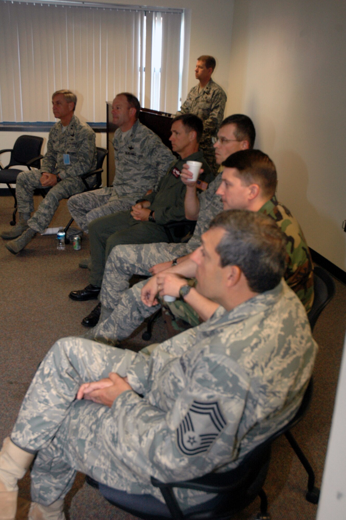 Members of specific panel with significant expeditionary contingency response experience talk to students participating in the planning team training for Air Force Exercise Eagle Flag 08-5 June 13, 2008, at the U.S. Air Force Expeditionary Center on Fort Dix, N.J.  Panel members talked about contingency readiness and planning for the students.  Eagle Flag is an exercise operated by the USAF EC's Expeditionary Operations School and 421st Combat Training Squadron that tests and trains deploying Airmen in expeditionary combat support skills.  Included in the panel were Maj. Gen. Kip Self, USAF EC commander, Col. Steven Sorenson, 818th Contingency Response Group commander at McGuire Air Force Base, N.J., Col. Mark Ellis, 817th CRG commander at McGuire, Col. Michael Hutchison, 305th Mission Support Group commander at McGuire, and others. (U.S. Air Force Photo/Tech. Sgt. Scott T. Sturkol)