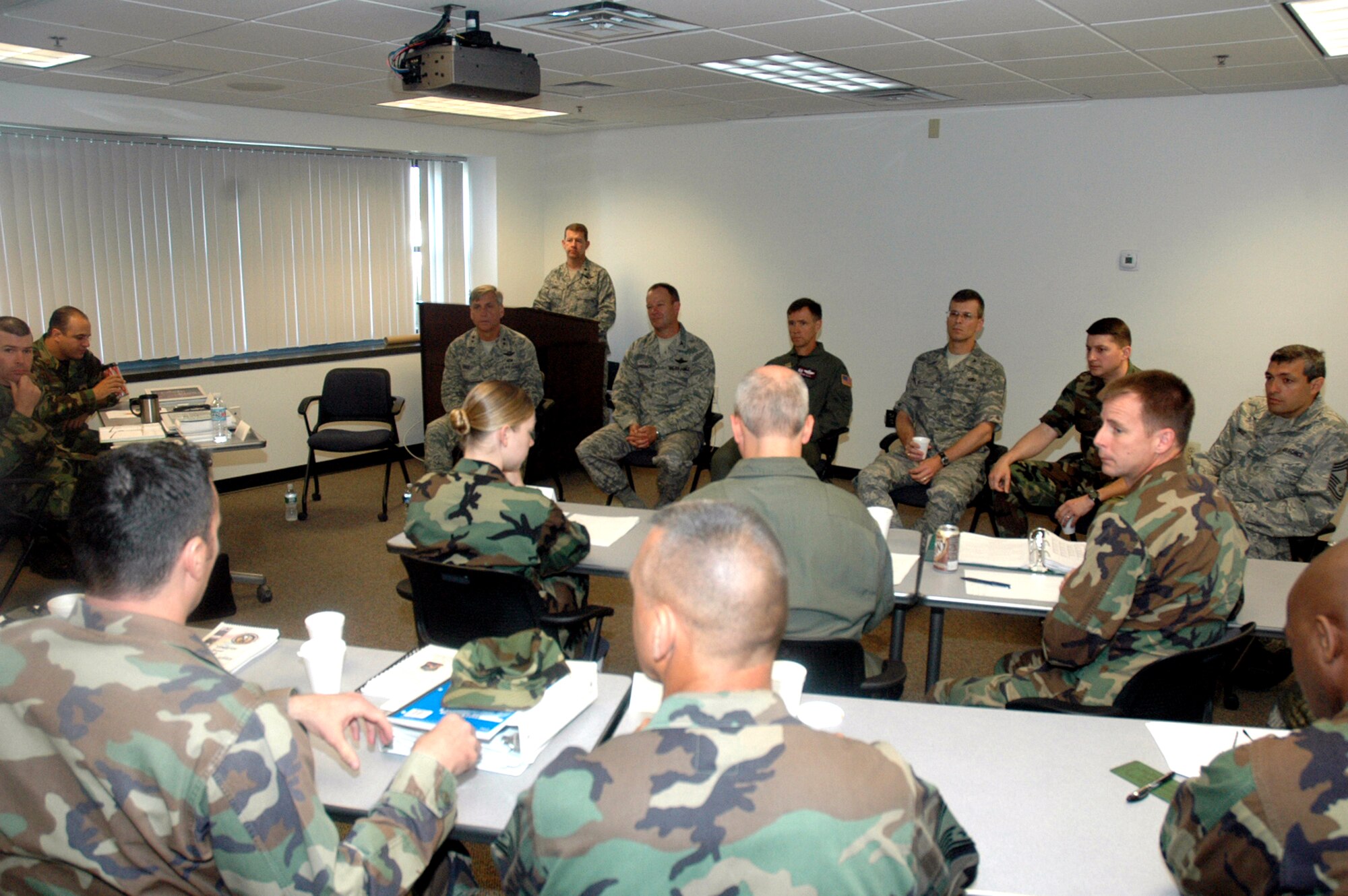 Members of specific panel with significant expeditionary contingency response experience talk to students participating in the planning team training for Air Force Exercise Eagle Flag 08-5 June 13, 2008, at the U.S. Air Force Expeditionary Center on Fort Dix, N.J.  Panel members talked about contingency readiness and planning for the students.  Eagle Flag is an exercise operated by the USAF EC's Expeditionary Operations School and 421st Combat Training Squadron that tests and trains deploying Airmen in expeditionary combat support skills.  Included in the panel were Maj. Gen. Kip Self, USAF EC commander, Col. Steven Sorenson, 818th Contingency Response Group commander at McGuire Air Force Base, N.J., Col. Mark Ellis, 817th CRG commander at McGuire, Col. Michael Hutchison, 305th Mission Support Group commander at McGuire, and others. (U.S. Air Force Photo/Tech. Sgt. Scott T. Sturkol)