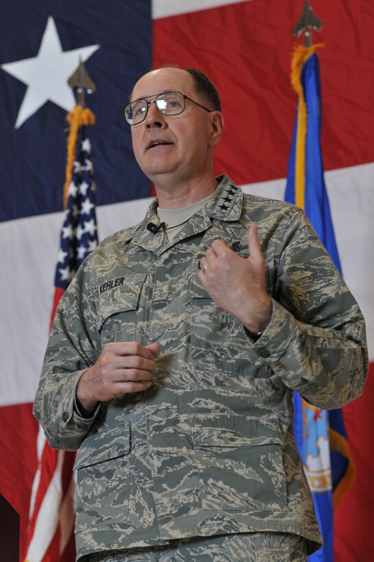 Gen. C. Robert Kehler, Air Force Space Command commander, speaks to Malmstrom Airmen at an all-call in the 3 Bay Hangar June 16. The visit was the second stop of a three-stop trip by the commander to address issues being faced among the ICBM wings. (U.S. Air Force photo/John Turner)