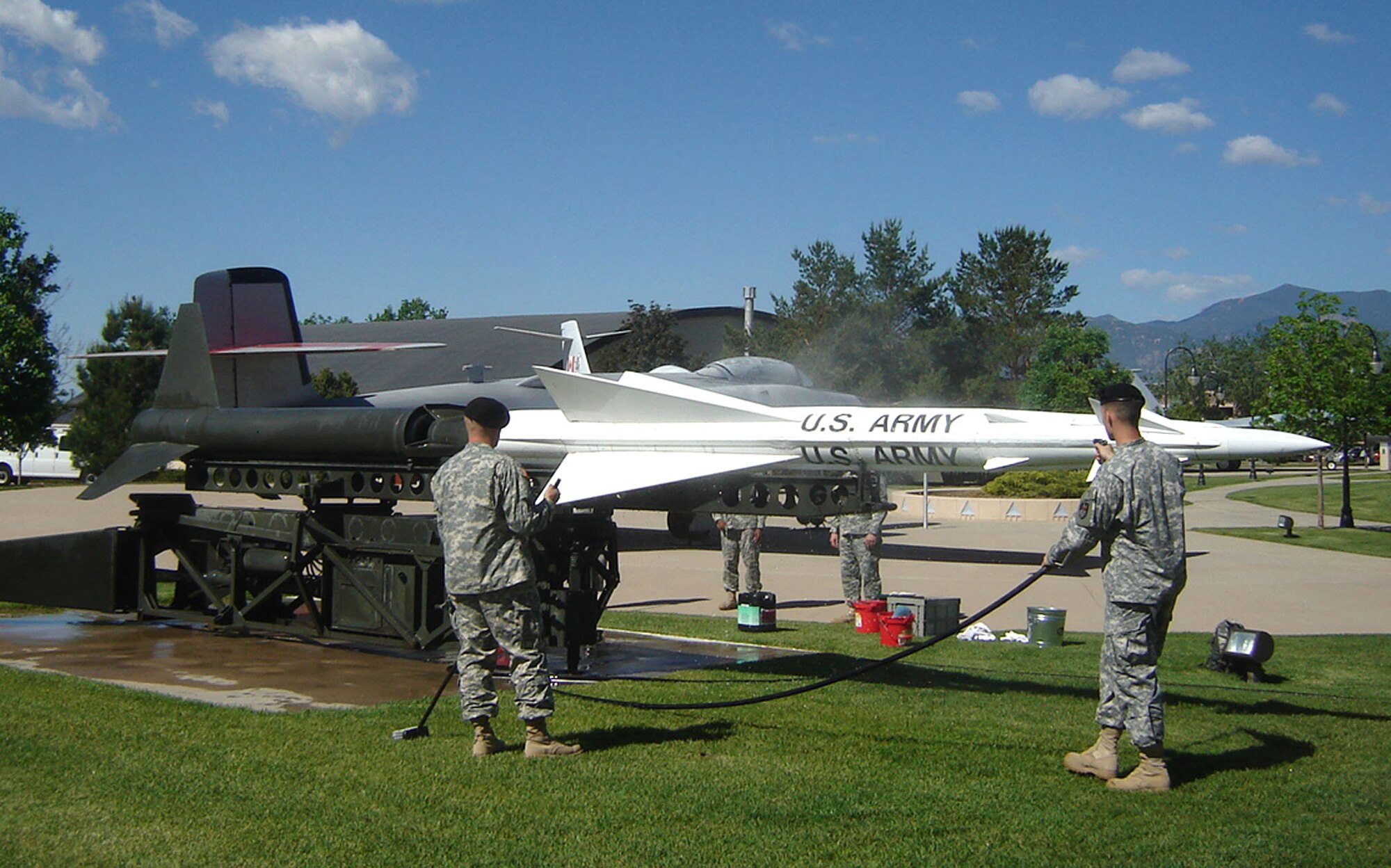 Soldiers from the 1st Space Company, 1st Space Battalion, participate in their first “Adopt-A-Missile” workday at the Peterson Air Force Base museum in Colorado. The Soldiers gave a much needed cleaning to the museum’s Nike Ajax surface to air missile display.  The Nike Ajax was the U.S. Army’s first operational guided SAM and saw service defending U.S. cities from air attack from 1954 to 1963. The 1st Space Battalion is assigned to the Army Space and Missile Defense Command at Peterson. Team Peterson organizations interested in adopting a museum aircraft or missile can contact Jeff Nash at 556-8314. (U.S. Air Force photo/Jeff Nash)