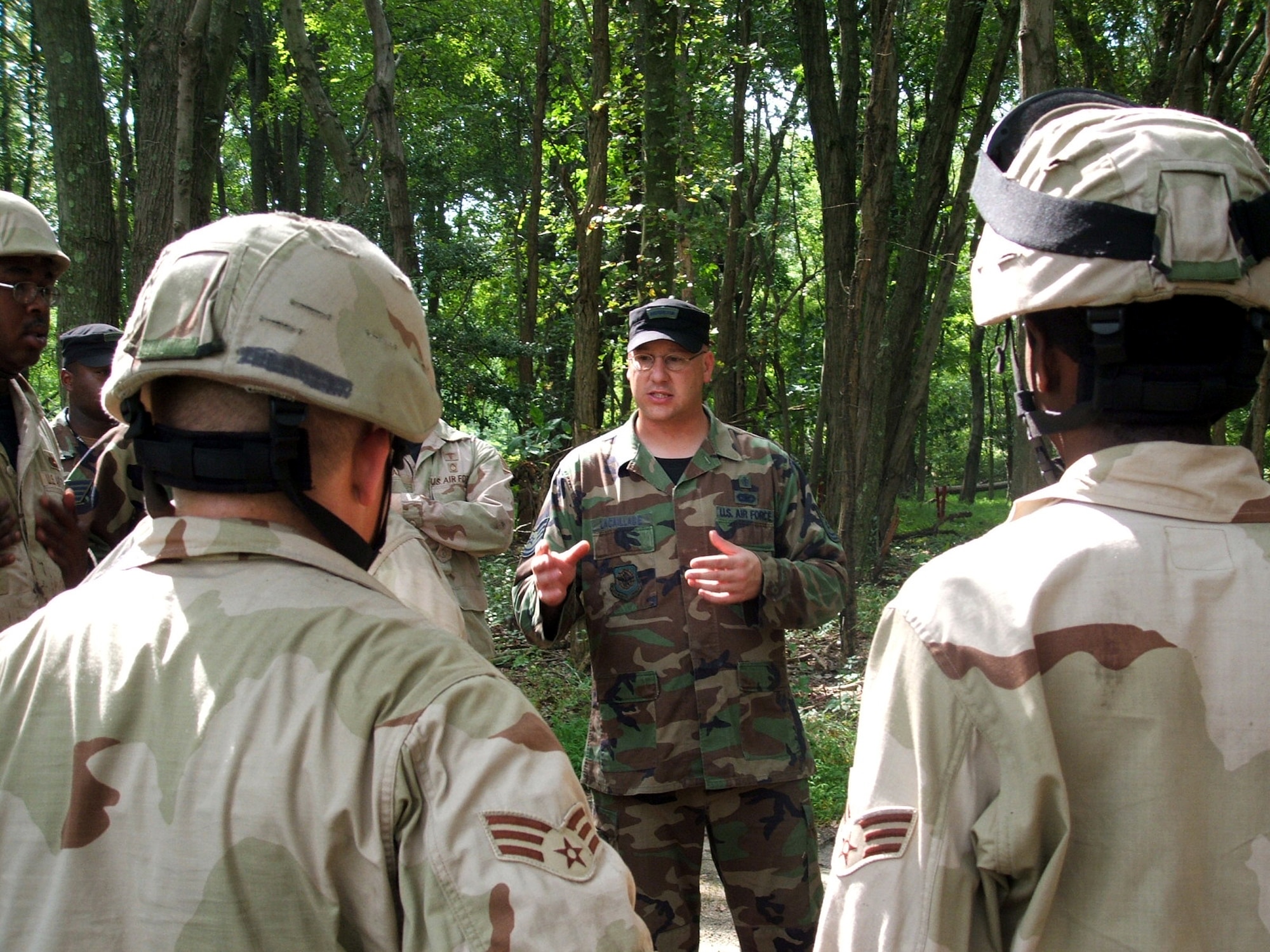 Tech. Sgt. Shane Lacaillade, medical instructor for the U.S. Air Force Expeditionary Center's 421st Combat Training Squadron at Fort Dix, N.J., provides feedback to Air Force security forces after they completed an obstacle course as part of combat first aid training during a past Advanced Contingency Skills Training Course.  Sergeant Lacaillade is currently deployed to the Iraqi Military Training Base of Kirkush, located in the Diyala Province just over 10 miles from the Iranian border.  He is assigned to the 732nd Expeditionary Logistics Readiness Squadron Det. 1 Logistics Military Advisory Team as one of only a few Airmen working in a position traditionally filled by the U.S. Army. (U.S. Air Force Photo/Tech. Sgt. Scott T. Sturkol)
