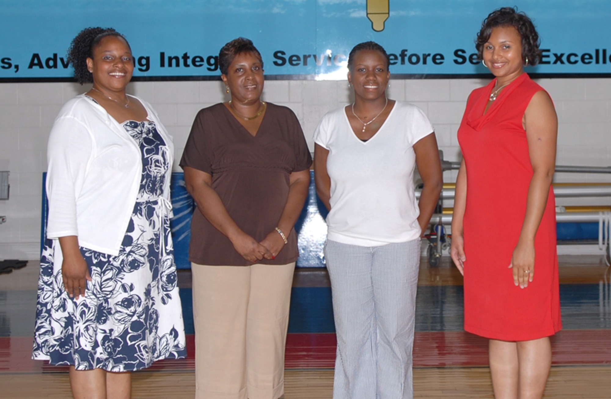 The Dime Divas took home first place in Columbus AFB's 2008 Biggest Loser competition. Members of this team pictured are: Beatrice Harris, Mary Deloach, Koronika Flournoy, and Andrea Randle. Dortha Hayden and Shirley Brown were also on the team. At the close of the competition, the 25 competing team lost a total combined of 720 pounds. (U.S. Air Force photo by Melissa Duncan)