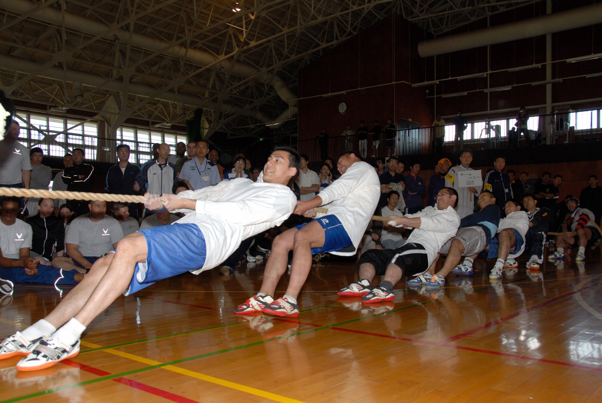 MISAWA AIR BASE, Japan -- Team Honey takes first place in the competition during the 7th annual tug-of-war competition on June 14, 2008.  Team Honey was comprised of members from the Northern Air Defense Control Group.  The Northern Air Defense Force/ Commanders Cup Tug-of-War competition is held annually to support and strengthen U.S. and Japanese relations.  (U.S. Air Force photo by Senior Airman Laura R. McFarlane)
