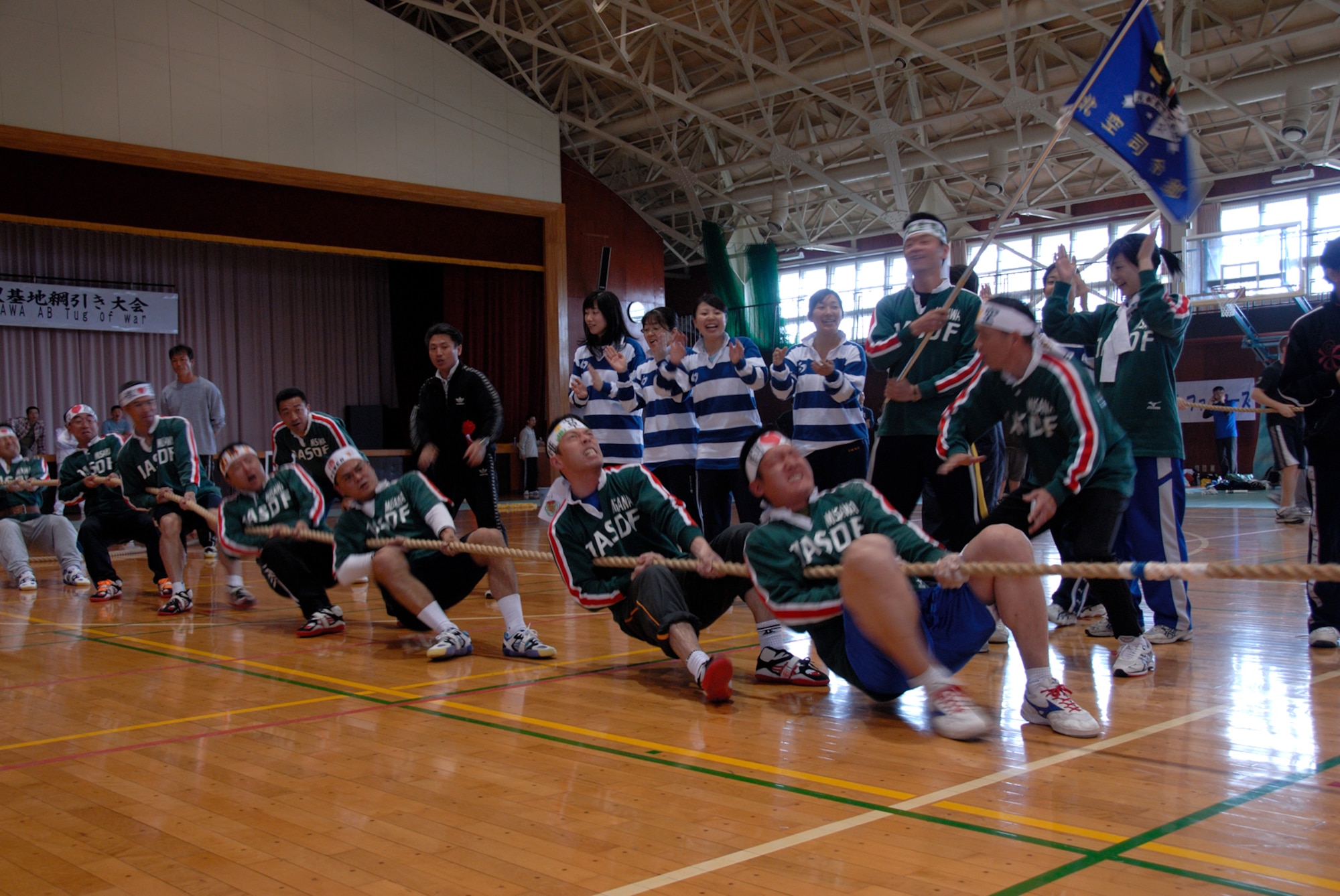 MISAWA AIR BASE, Japan -- Team Northern Stars tug their way to a win during the 7th annual tug-of-war competition on June 14, 2008.  Team Northern Stars consisted of members from the Northern Air Defense Force Head Quarters.  The Northern Air Defense Force/ Commanders Cup Tug-of-War competition is held annually to support and strengthen U.S. and Japanese relations.  (U.S. Air Force photo by Senior Airman Laura R. McFarlane)