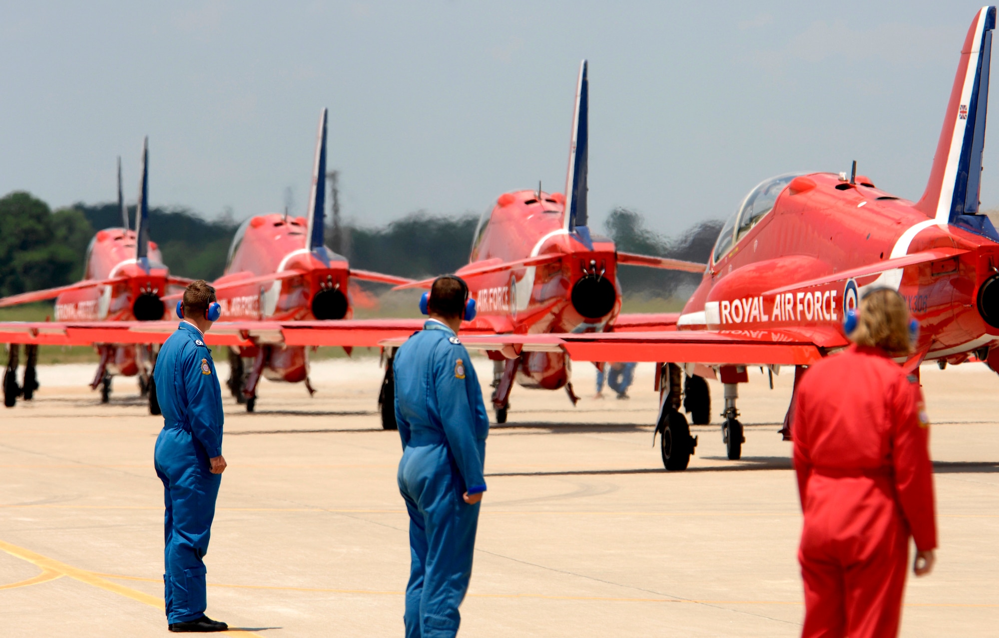 LANGLEY AIR FORCE BASE, Va. -- The British Royal Air Force Aerobatic Team, The Red Arrows, taxi down the runway before practicing a dissimilar formation here June 18. The Red Arrows will perform at AirPower over Hampton Roads, Langley’s air show, which is scheduled for June 20 to 22. (U.S. Air Force photo/Airman 1st Class Aaron Johnson)
