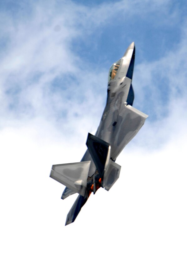 LANGLEY AIR FORCE BASE, Va. -- Maj. Paul "Max" Moga, the first F-22A Raptor Demonstration Team pilot, does a max climb seconds after takeoff during a practice demonstration here June 18. The F-22 demo team will perform at AirPower over Hampton Roads, Langley’s air show, which is scheduled for June 20 to 22. (U.S. Air Force photo/Airman 1st Class Aaron Johnson)