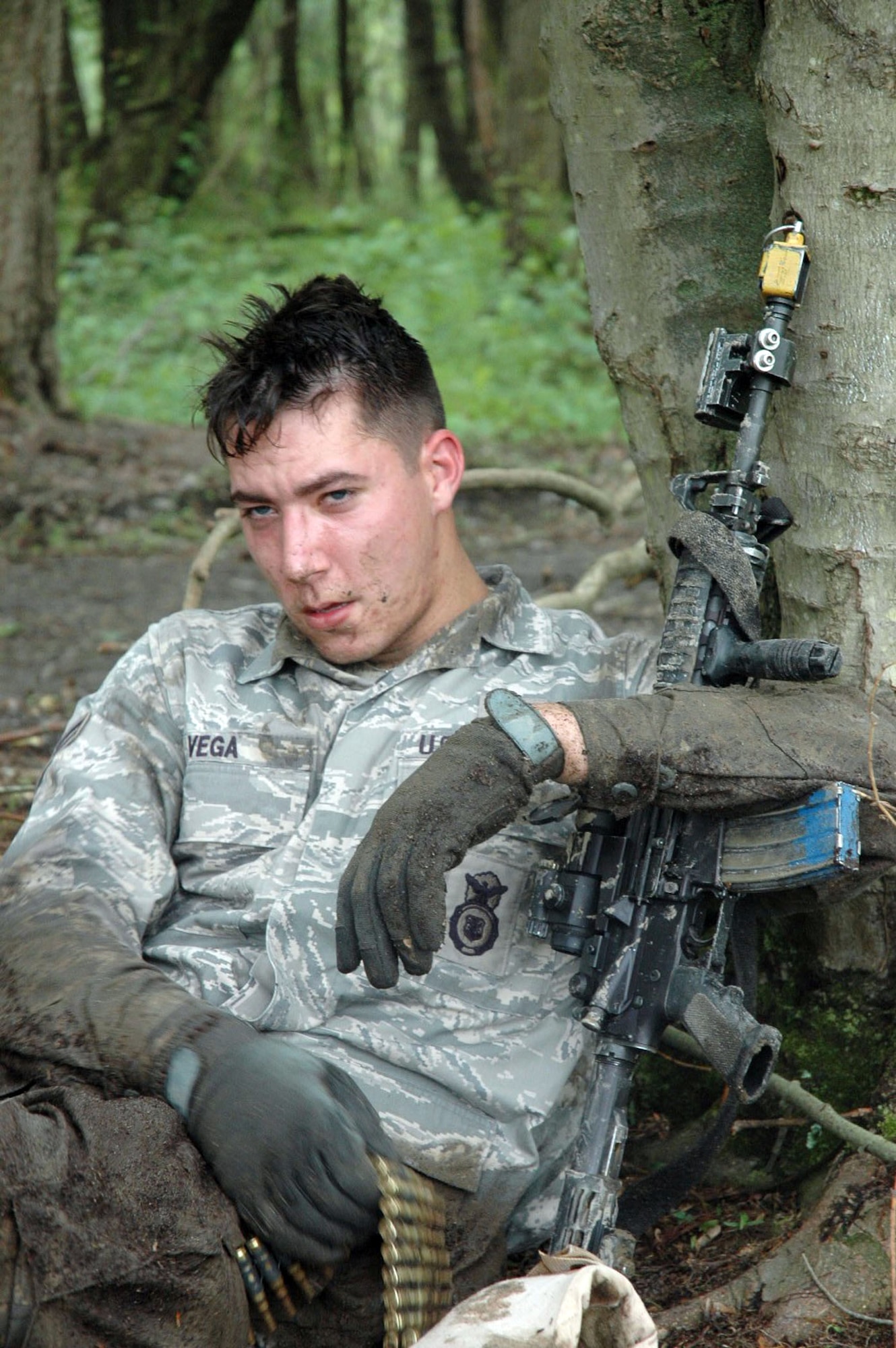 Airman 1st Class John Vega takes a rest after he and other students in the Air Force Phoenix Warrior Training Course completed a run on an obstacle course for a combat first aid class June 5 at Fort Dix, N.J. Phoenix Warrior trains Airmen for upcoming deployments and is operated by members of Air Force Expeditionary Center's Expeditionary Operations School and 421st Combat Training Squadron. Airman Vega is from the 30th Security Forces Squadron, Vandeburg Air Force Base, Calif.
(U.S. Air Force Photo/Staff Sgt. Paul R. Evans) 