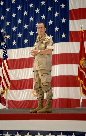Adm. Mike Mullen, chairman of the Joint Chiefs of Staff holds an "Airmen's Call" in the Thunderbirds Hangar at Nellis Air Force Base, Nev., June 17.  The Admiral began the "Airmen’s Call" by honoring and recognizing Nellis Airmen. After recognizing Nellis Airmen, he then commented on current military issues and capabilities, then opened the floor to any Airmen who had questions for him, with topics ranging from rising fuel prices and its impact on the Air Force mission, the resignation of the Air Force's top officials, force drawback, future challenges for the Air Force, and increased deployment and operations tempo. (U.S. Air Force photo/ Airman 1st Class Brian Ybarbo)