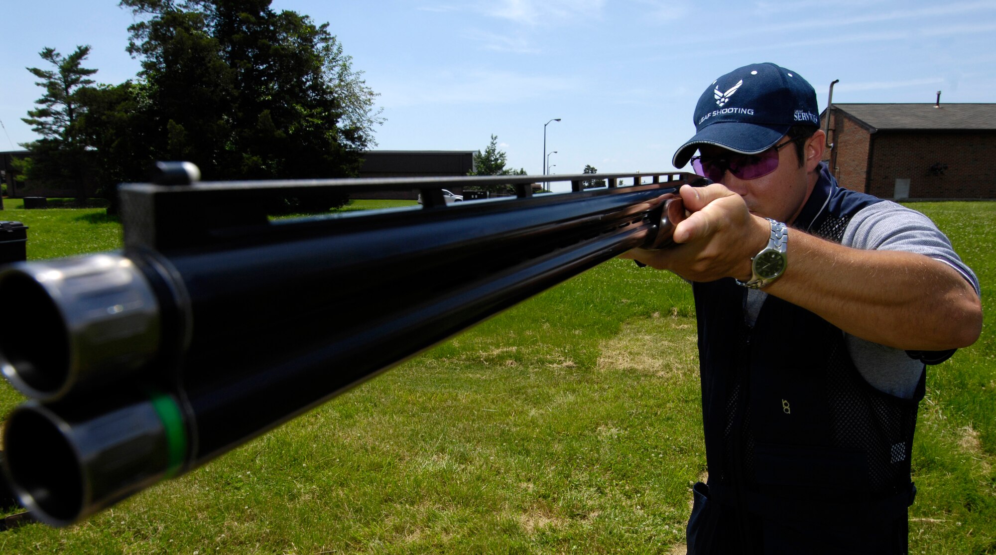 SCOTT AIR FORCE BASE, Ill. -- Tech Sgt. Scott Hadley, 19th Air Operations Squadron tactical air patrol party and also a member of the Air Force’s shooting team, prepares his weapon for a shooting demonstration. Sergeant Hadley is originally from Lebanon, Ill., and has competed in events in Mississippi, Kentucky, Wisconsin, Virginia, Maryland and Tennessee, where he was crowned state champion last year.
(U.S. Air Force photo/Senior Airman Mildred Guevara)