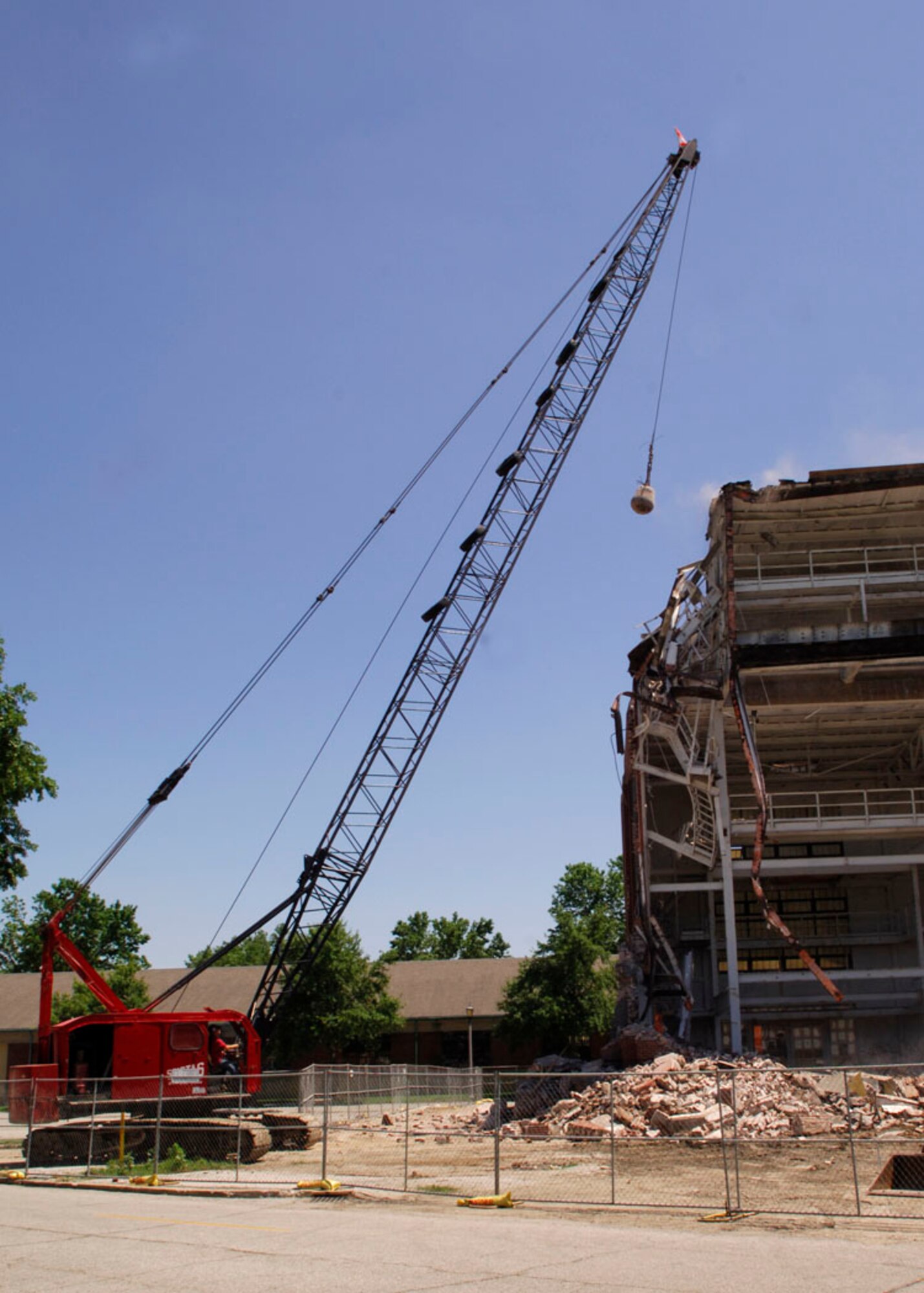 SCOTT AIR FORCE BASE, Ill. -- Crews from Lake Environmental Inc. begin demolition on the old building 45 Boiler House at Scott Air Force Base on June 10. Options are being explored for possible uses of this location, as well as several other buildings currently slated for demolition, though none have yet been decided. More details about plans for the sites will be released as they are made available. 
(U.S. Air Force photo/Airman 1st Class Wesley Farnsworth)