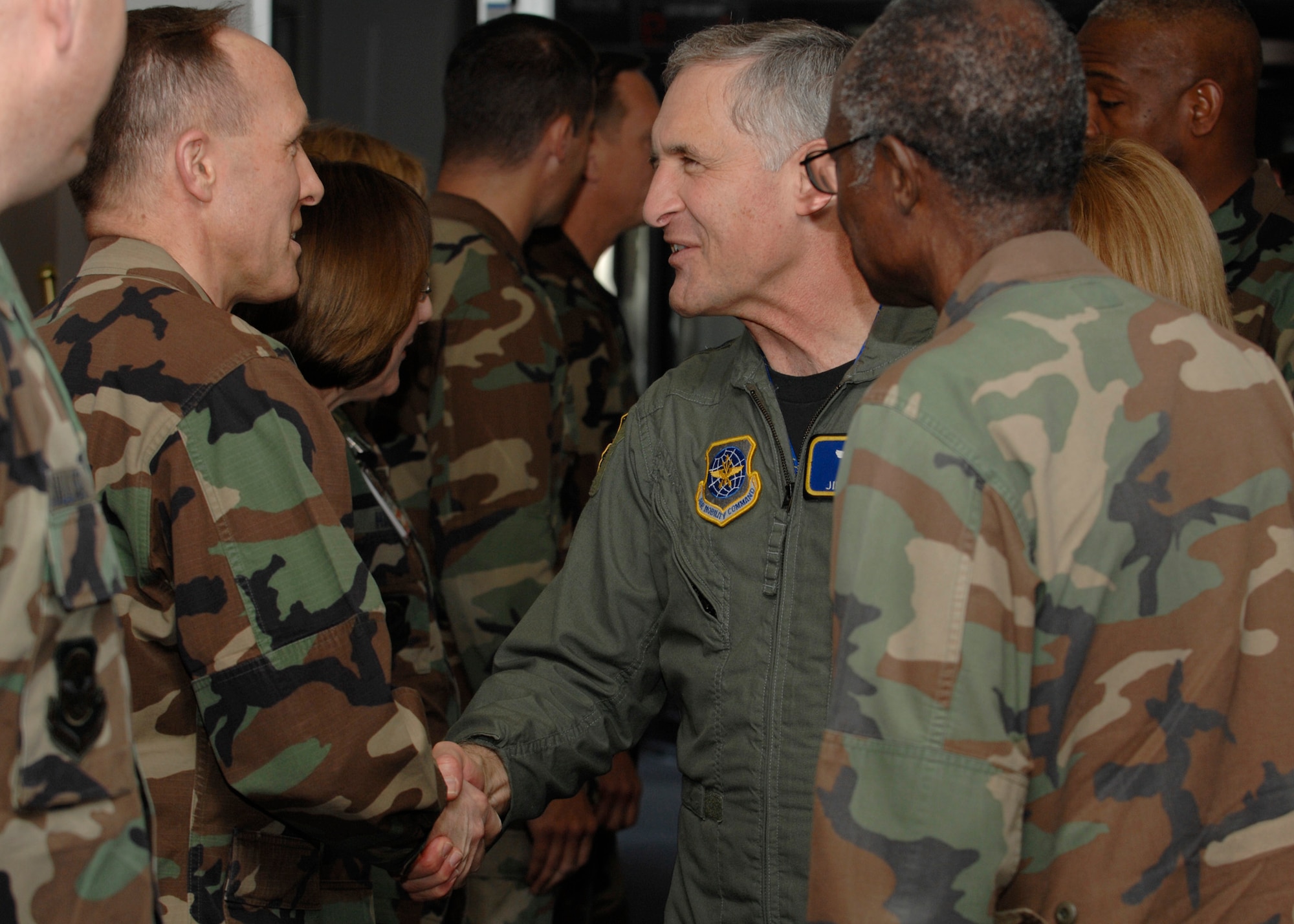 SCOTT AIR FORCE BASE, Ill. --In addition to their wing duties, the 375th Airlift Wing Protocol Office is also in charge of protocol for the 18th Air Force headquartered at Scott. Shown here, 18th Air Force Commander Maj. Gen. James Hawkins make an official visit to troops.
(courtesy photo)