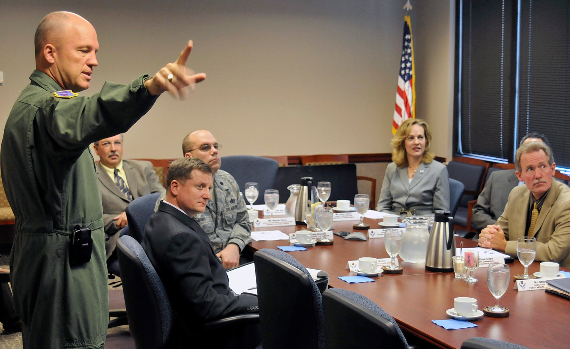 Col. Jay Raymond, 21st Space Wing commander, explains the 21st SW’s global mission to the El Paso County commissioners June 17. With geographically separated units around the world, the 21st SW provides flawless missile warning and space control operations to defend America and its allies.  (U.S. Air Force photo/Larry Hulst)