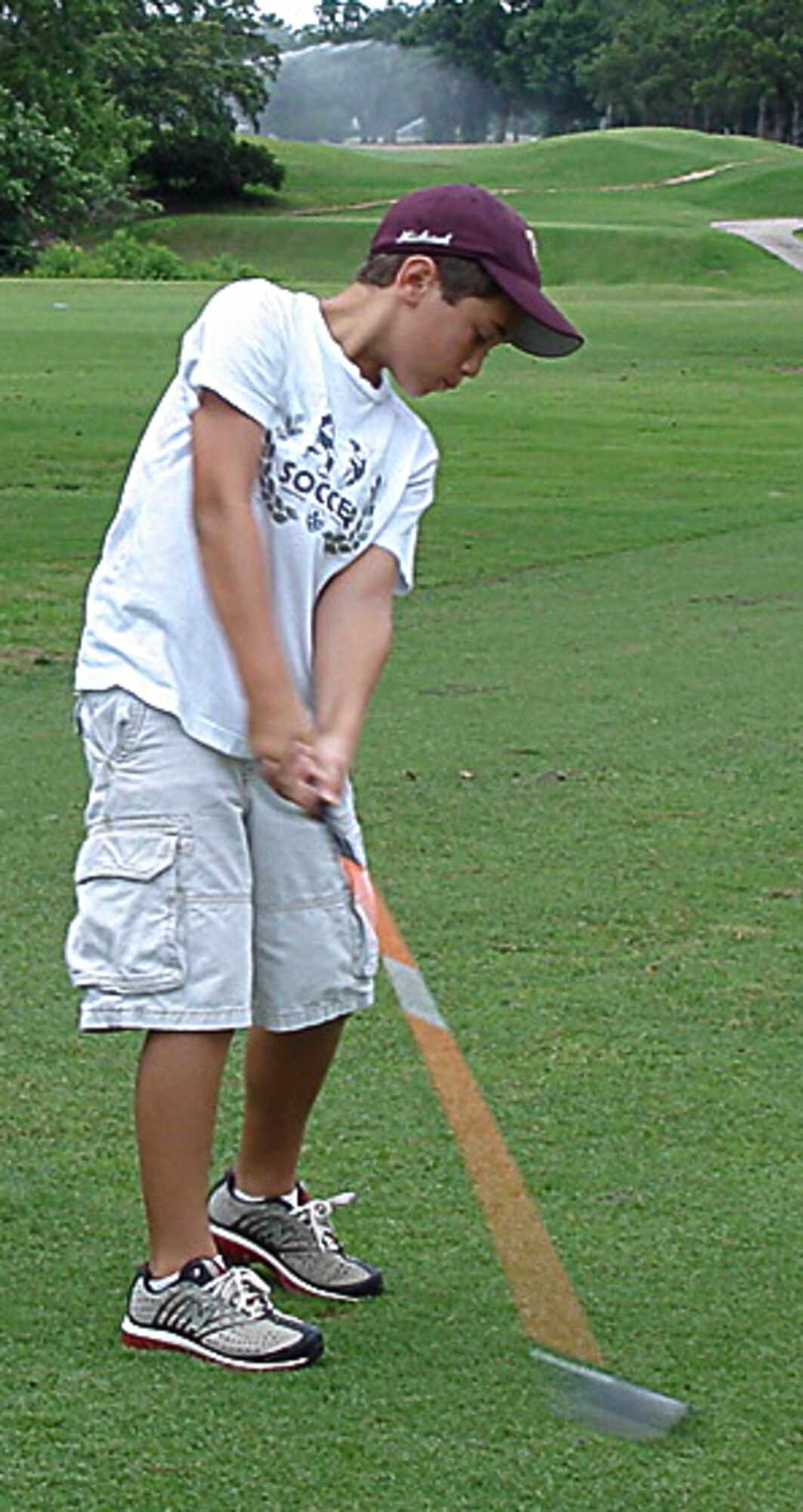 Eglin Golf Clinic participant, Michael Berghoff practices his putting techniques during the June 9-12 classes. (Courtesy Photo)