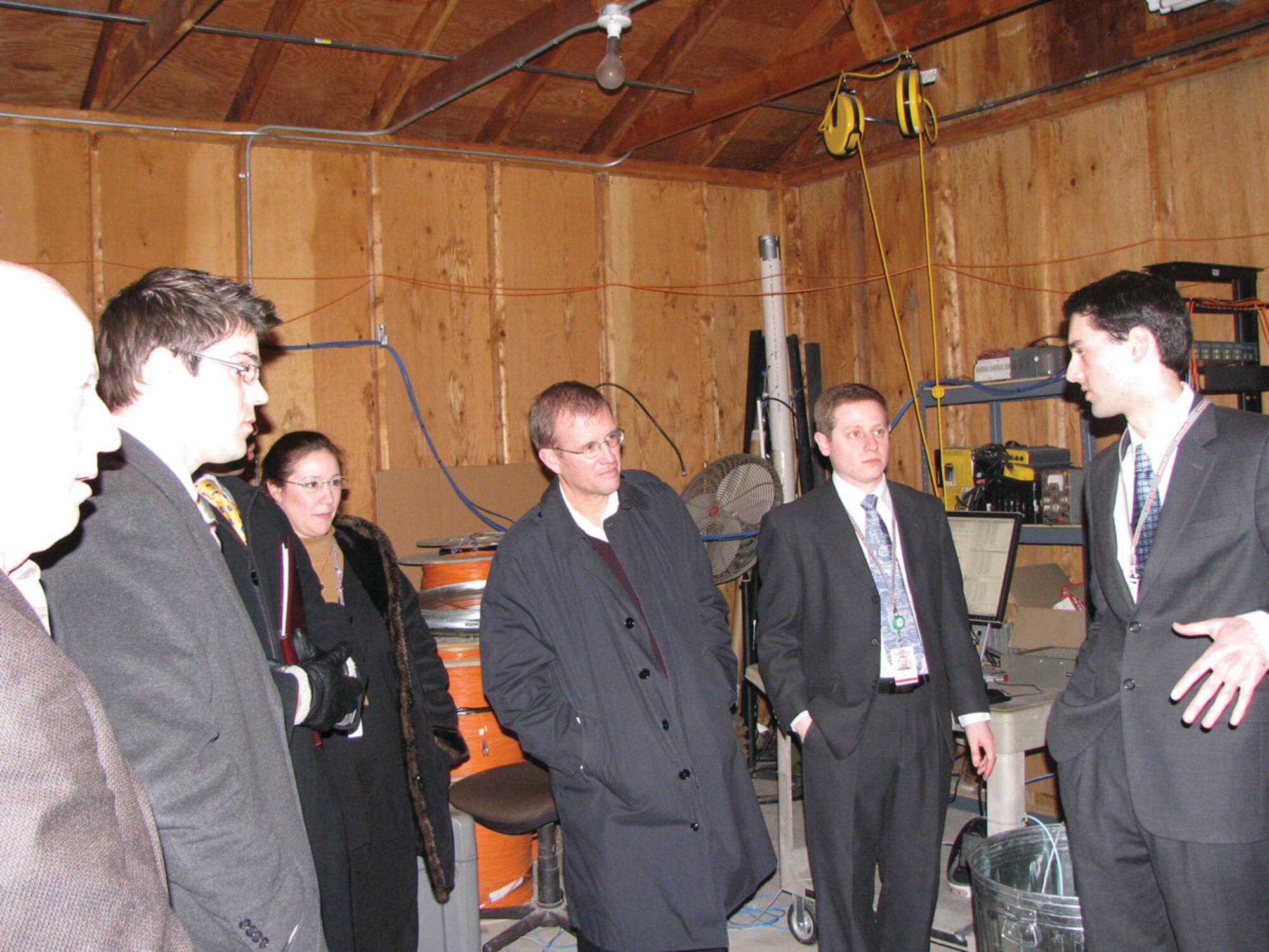 Pictured left to right are BAE Systems/Defense Advanced Research Projects Agency (DARPA) MUD Radio Development team members Mr. Joshua Niedzwiecki (BAE), Dr. Rachel Learned (BAE), Dr. Brian Pierce (DARPA), and John Tranquilli and Joseph Farkas (BAE).  