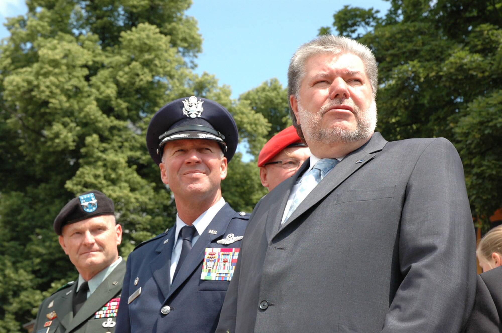 Together with Rheinland-Pfalz Minister President, Kurt Beck, the wing commander of the 52nd Fighter Wing, Col. Lee Wight observes the Rheinland-Pfalz state fair parade June 15 in Bad Neuenahr-Ahrweiler.  The 52nd Fighter Wing and the U.S. Air Forces in Europe Band represented the Air Force at the three-day event. (U.S Air Force Photo/Iris Reiff)
